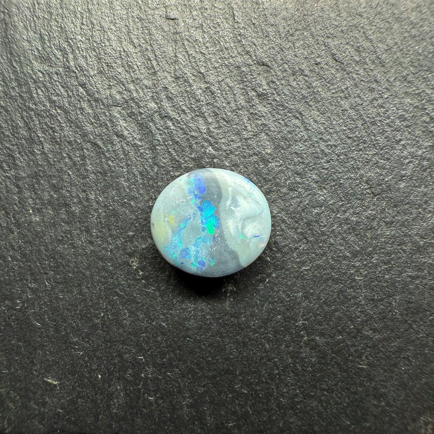 Black Opal With Great Color Dispersal And A Small Flash Pattern