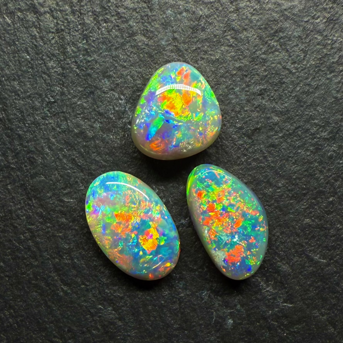 (Price per Stone) Dark opals With vivid Green -Gold Color Palettes and Pinfire Like Patterns