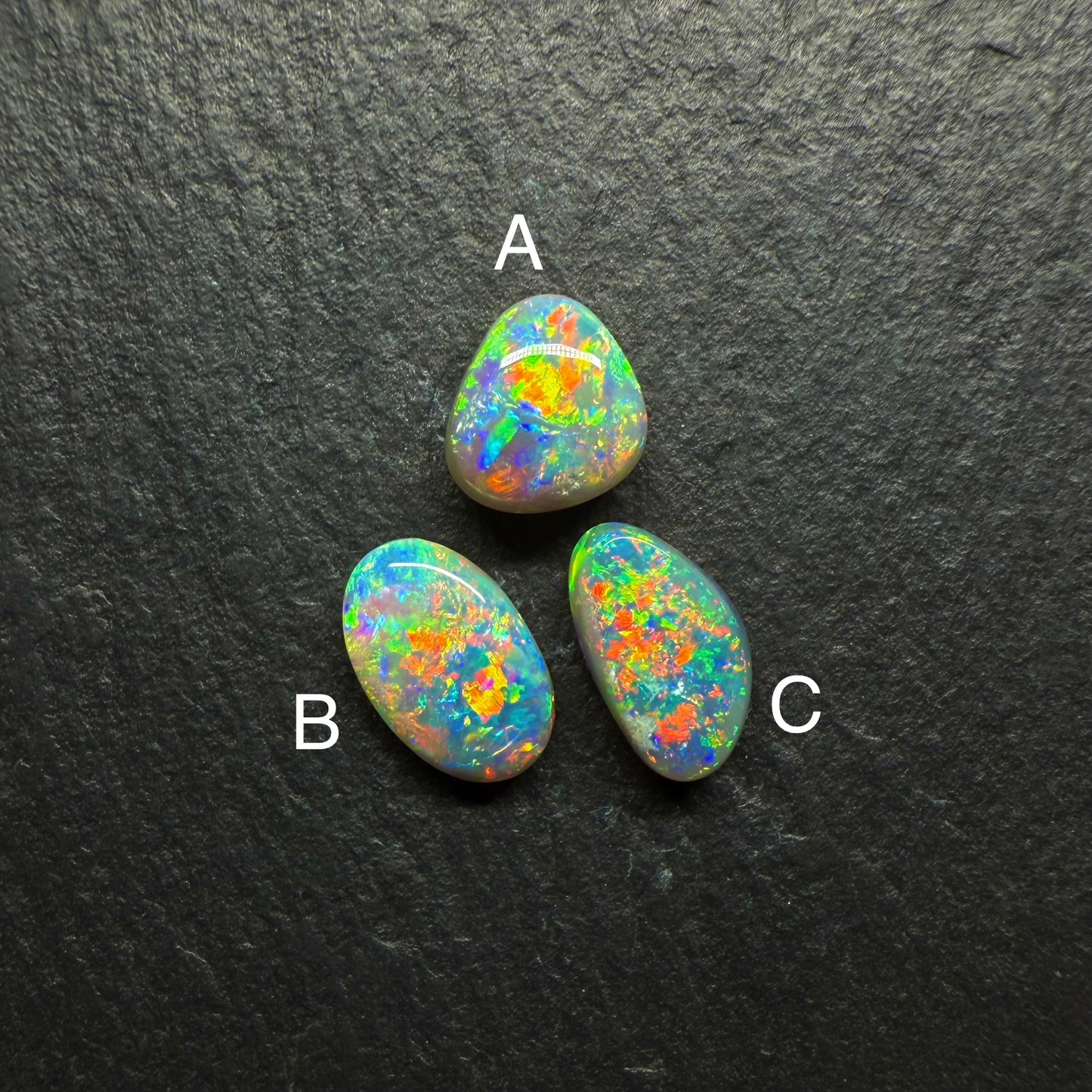 (Price per Stone) Dark opals With vivid Green -Gold Color Palettes and Pinfire Like Patterns