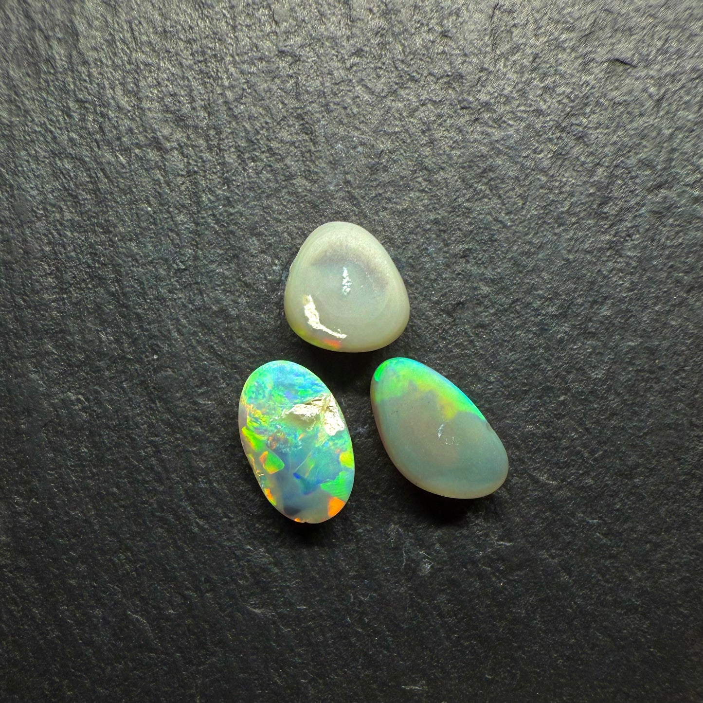 (Price per Stone) Dark opals With vivid Green -Gold Color Palettes and Pinfire Like Patterns