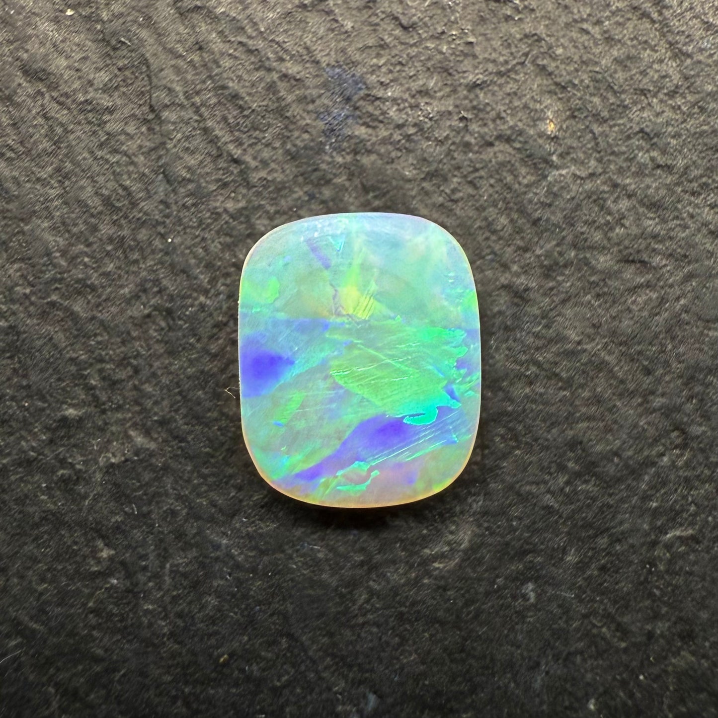 0.83ct Cushion Cut Crystal Opal With A Blocky Pattern And A Multi Color Palette