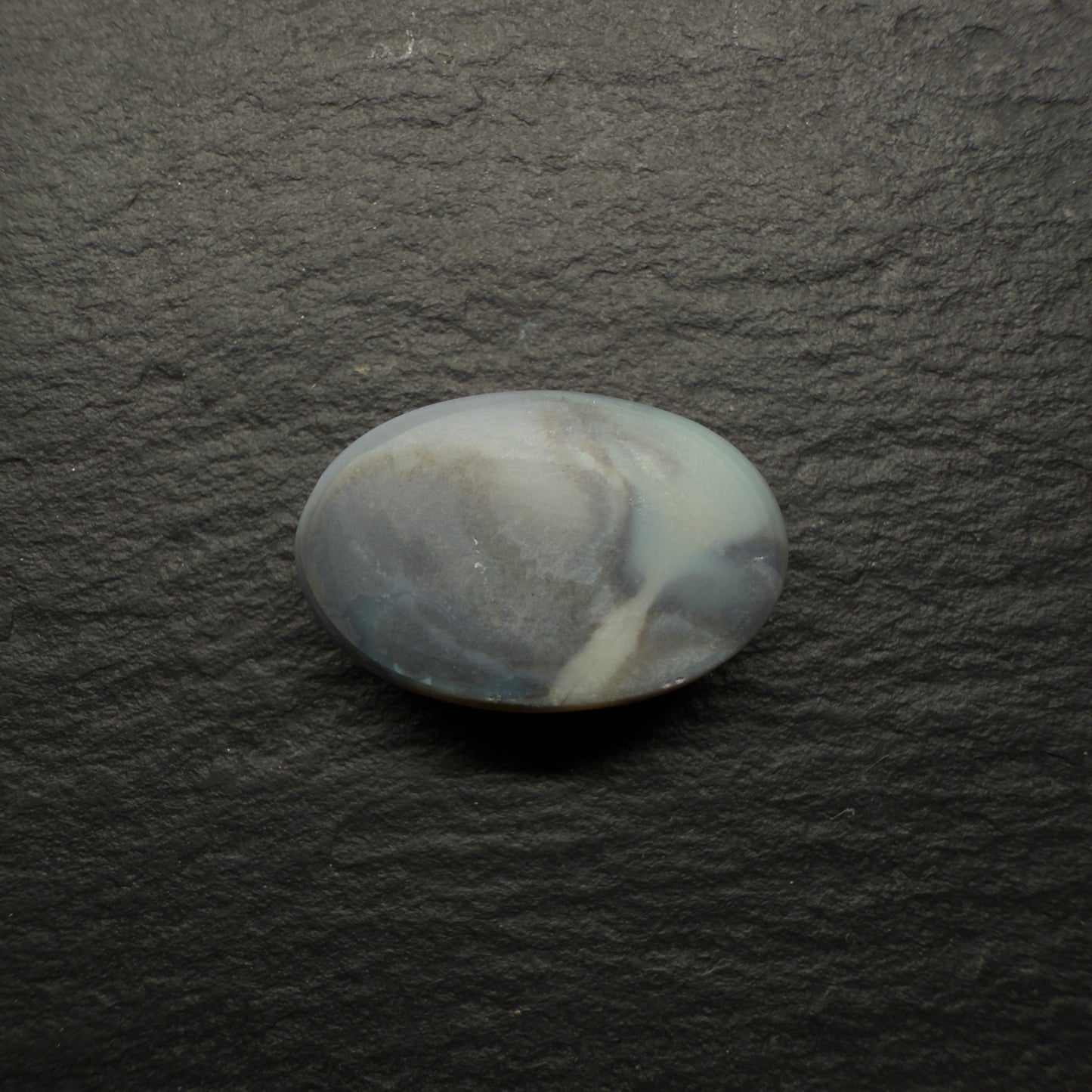 6.64ct World Class Black opal With Brilliant Green-Gold Color play And A Rolling Broad Flash Pattern