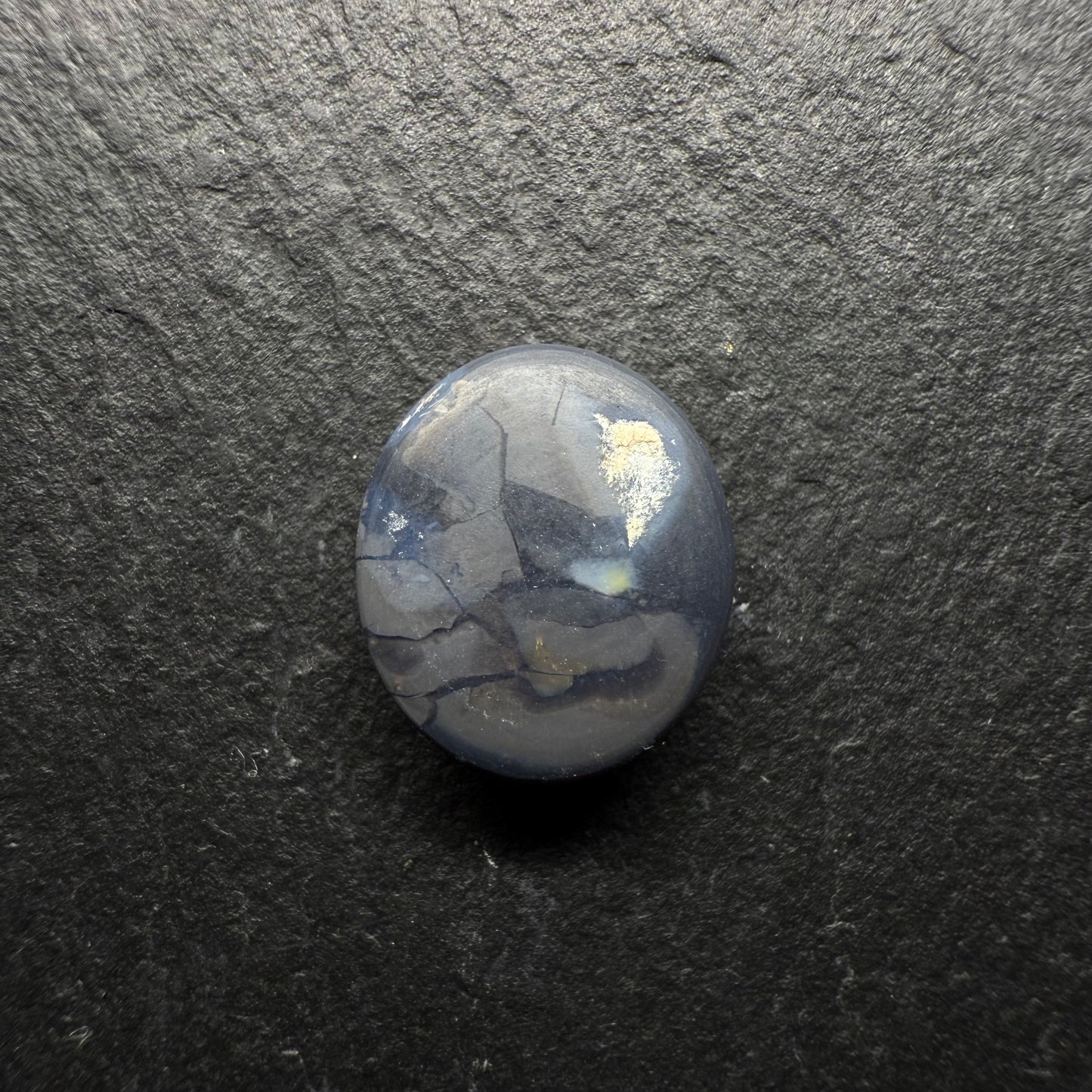 2.5ct Top Gem Black Opal With Avivid Dark Green Color Palette, Hints Of Blue And A Broad-flash Pattern