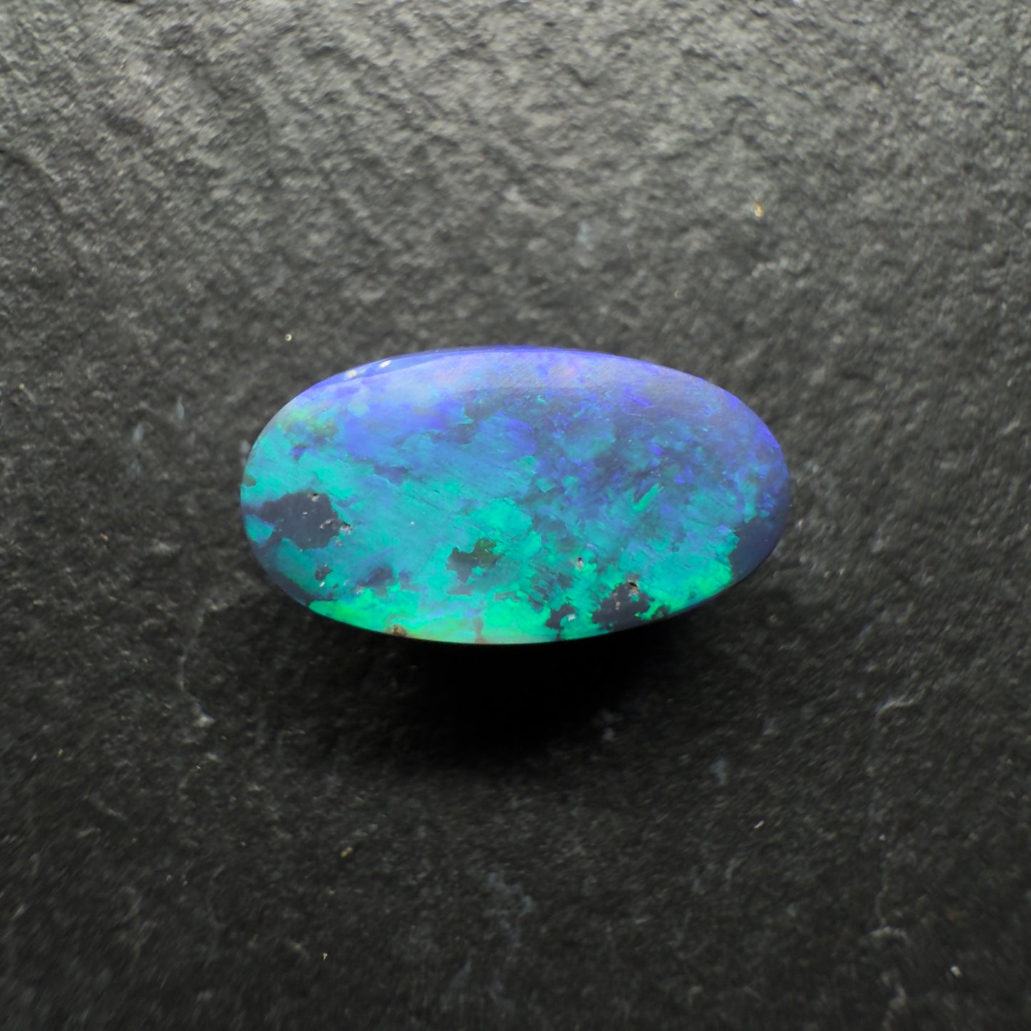 1.85ct Gem Black Opal With A Vivid Green-Blue Wispy Broadflash Pattern