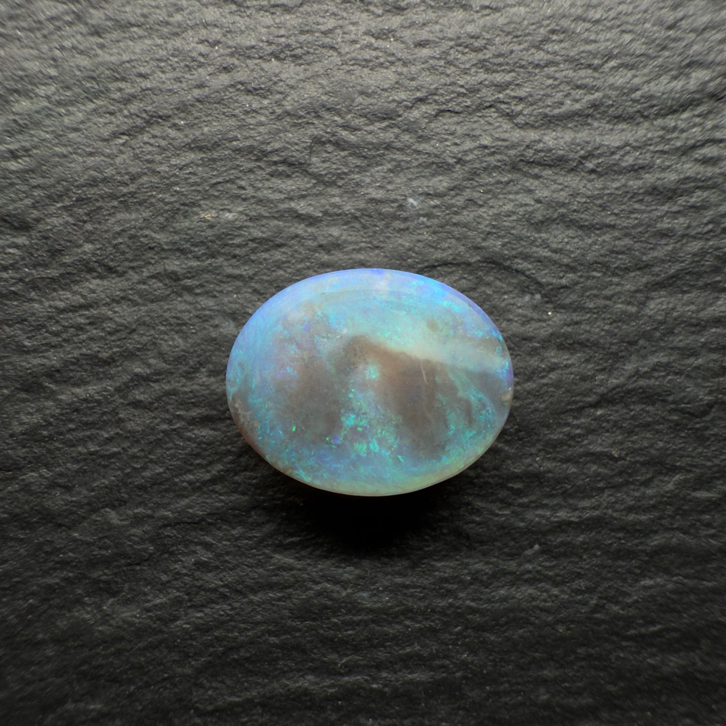 1.64ct Black Crystal Opal With A Minty Green Color Palette And Unique Pattern
