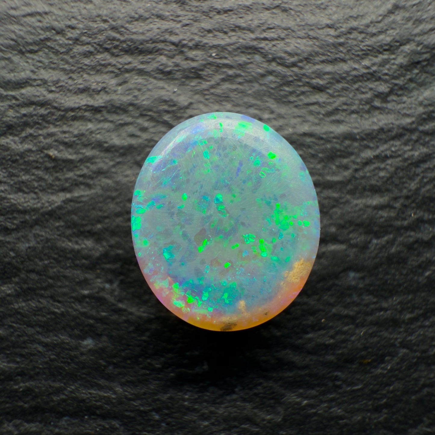 1.7ct Gem Dark Crystal Opal, This Gem Has A Phenomenal Cats Eye Pattern That rolls Across The Stone With Movement