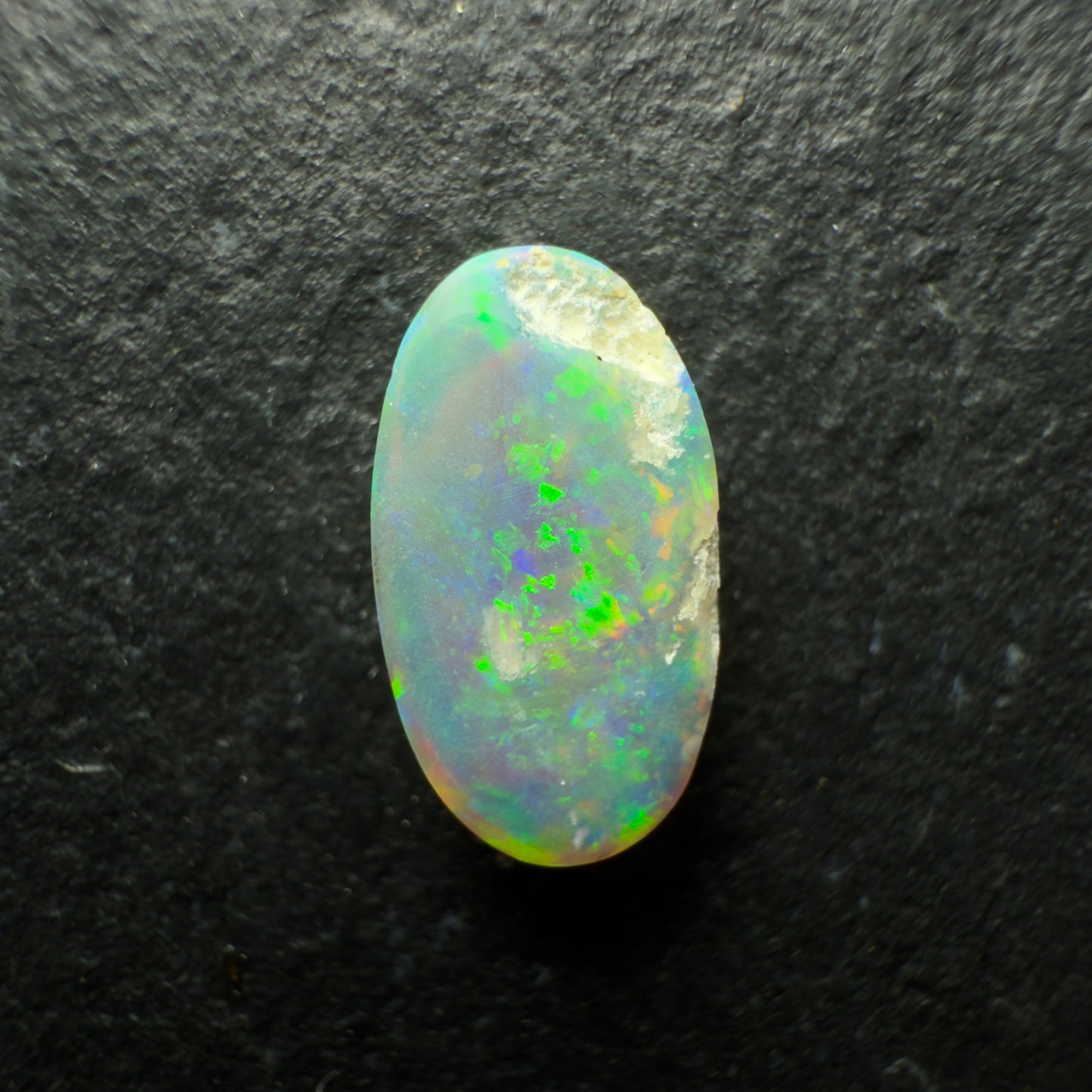 0.83ct Dark Crystal Opal With Lovely Multicolor Palette And Lots Of Depth