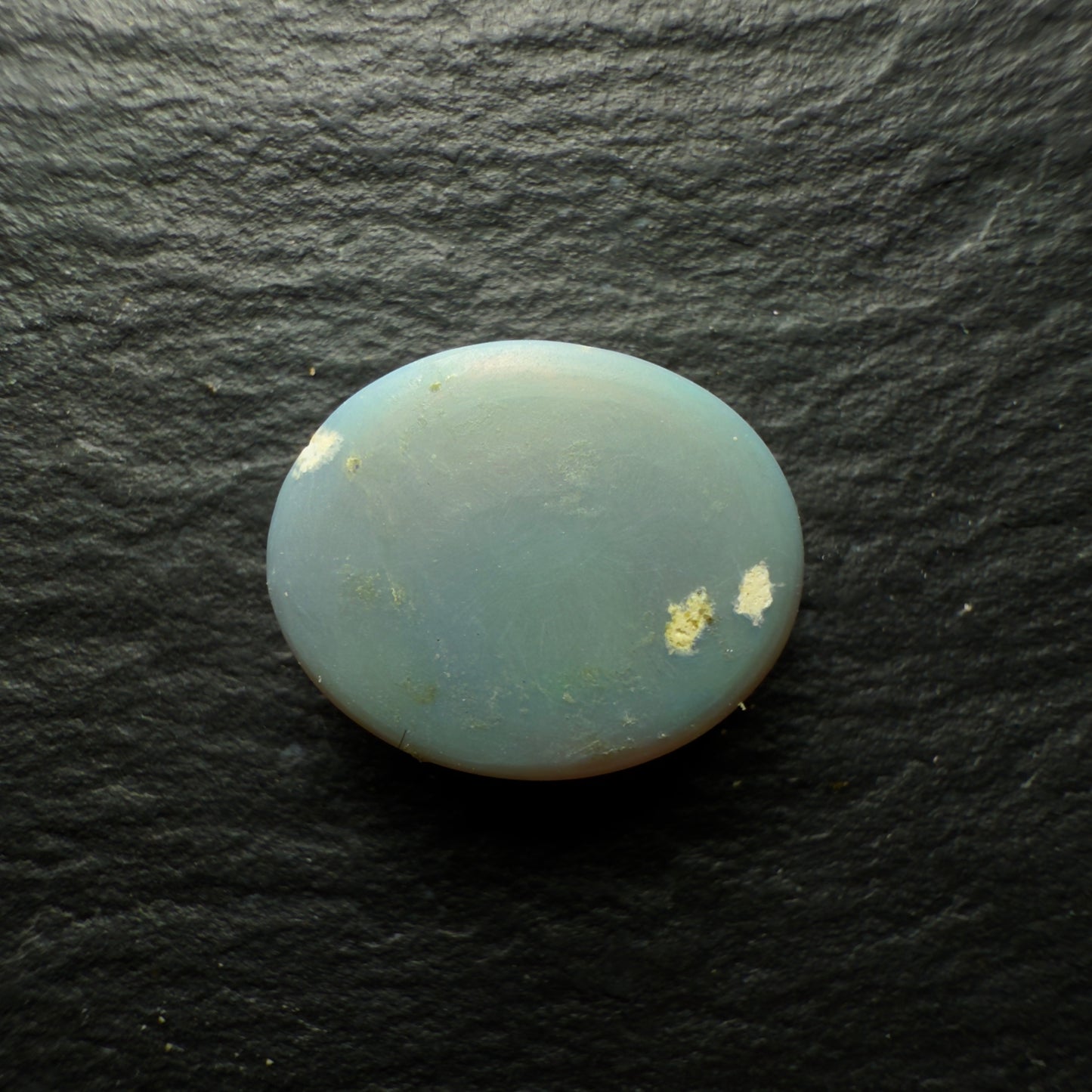 2.44ct Dark Opal, This Gem Has An Unusual Mix Of Patterns And A Pastel Blues And Green Color Palette