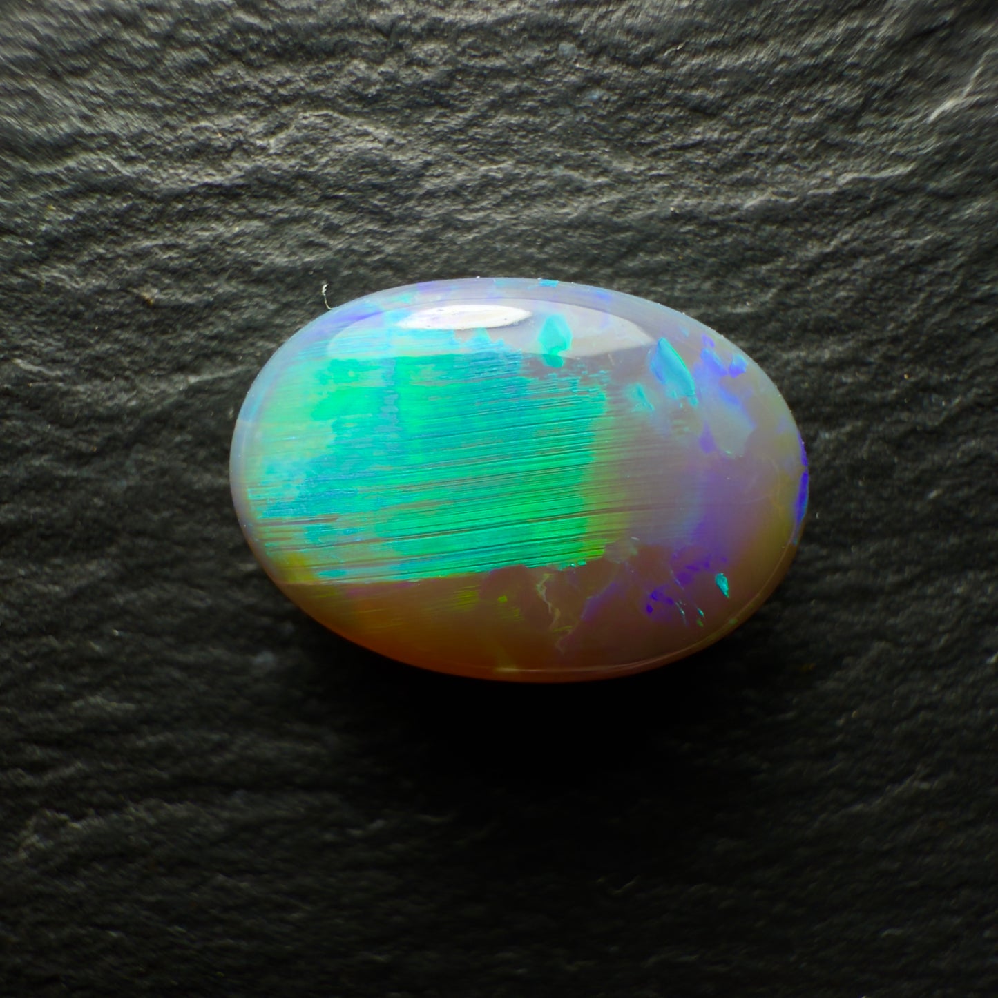 2.99ct Black Opal With A Bright Minty Green Broadflash and Chaff Pattern