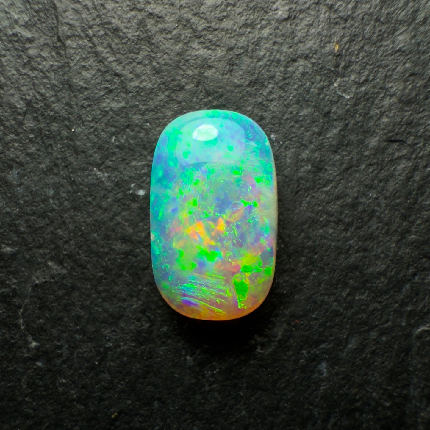 0.89ct Crystal Opal, This Cushion Cut Gem Has Green-Gold Color Palette With Mixed Patterns And Lots Of Depth