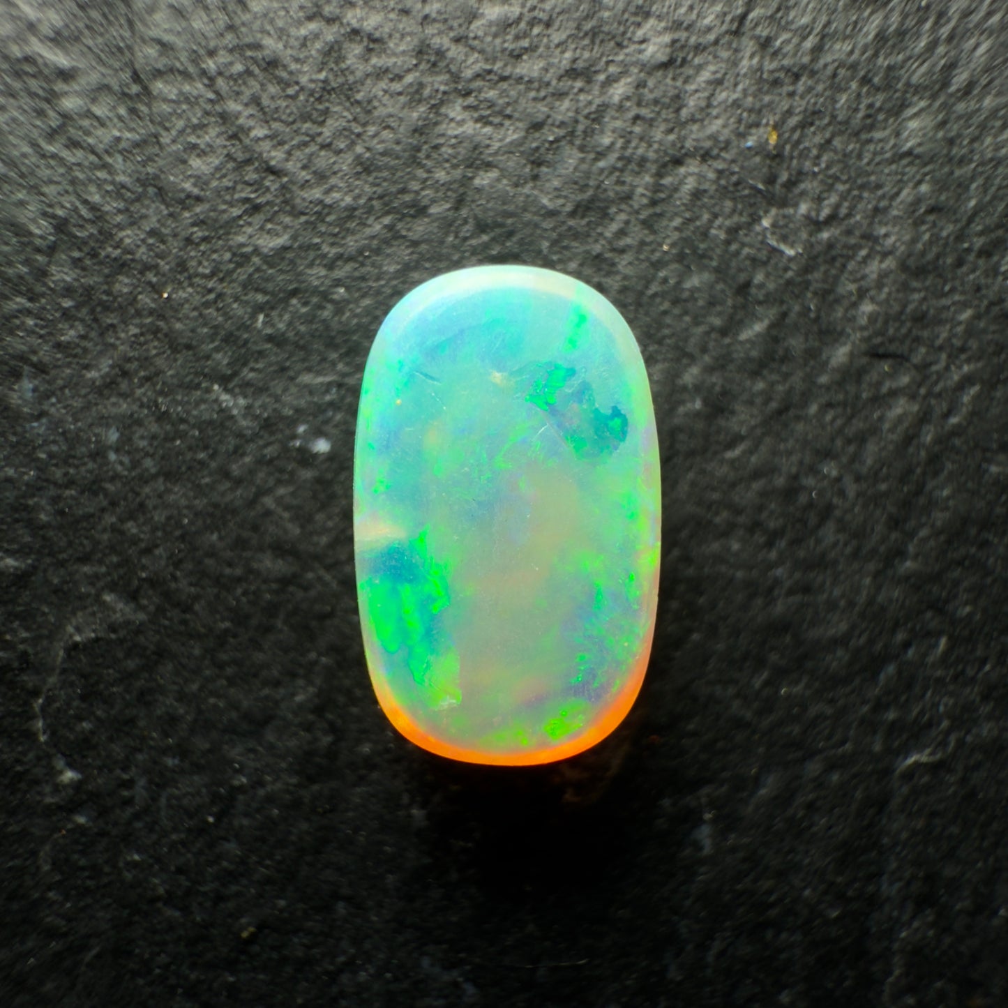 0.89ct Crystal Opal, This Cushion Cut Gem Has Green-Gold Color Palette With Mixed Patterns And Lots Of Depth