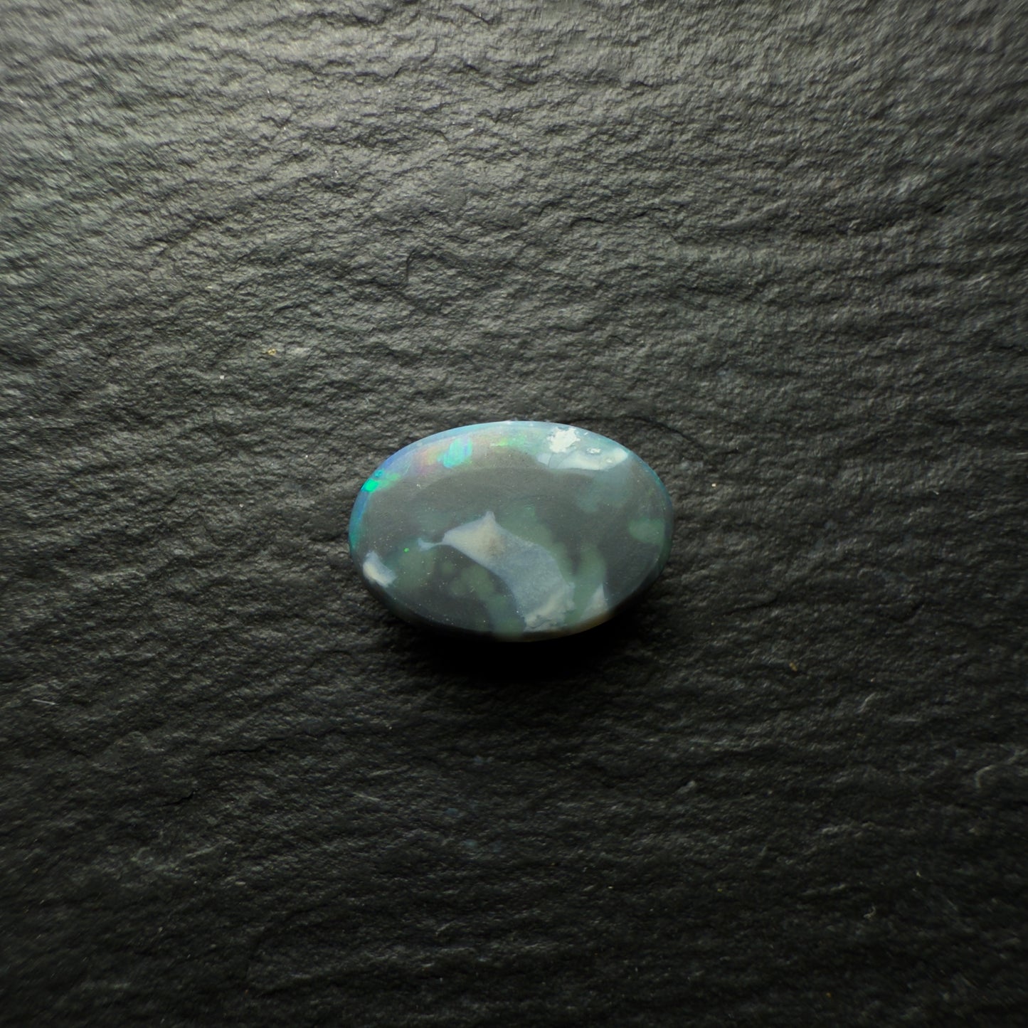 1.05ct Black Opal With A Lovely Green-Blue Speckled Pattern