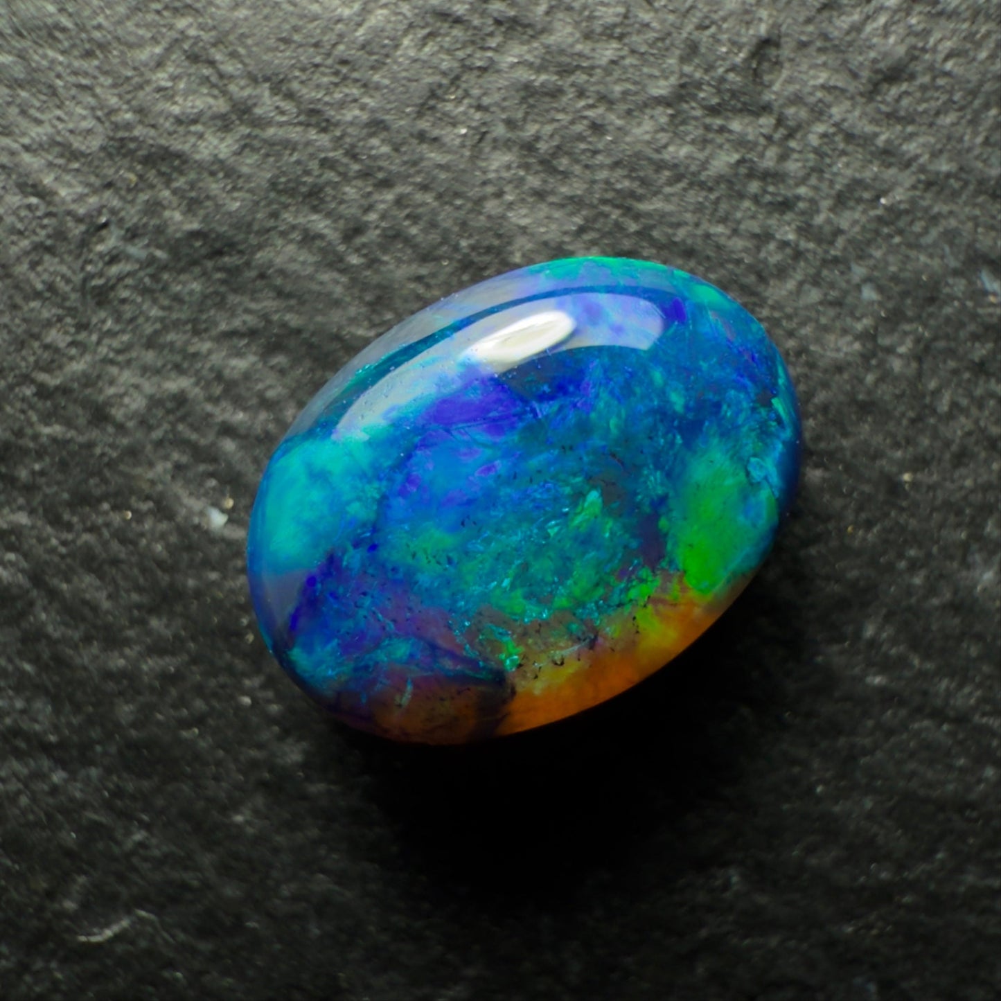 0.88ct Black Opal, This Gem Has A Dark Blue-Green Color Palette With A Mossy Pattern