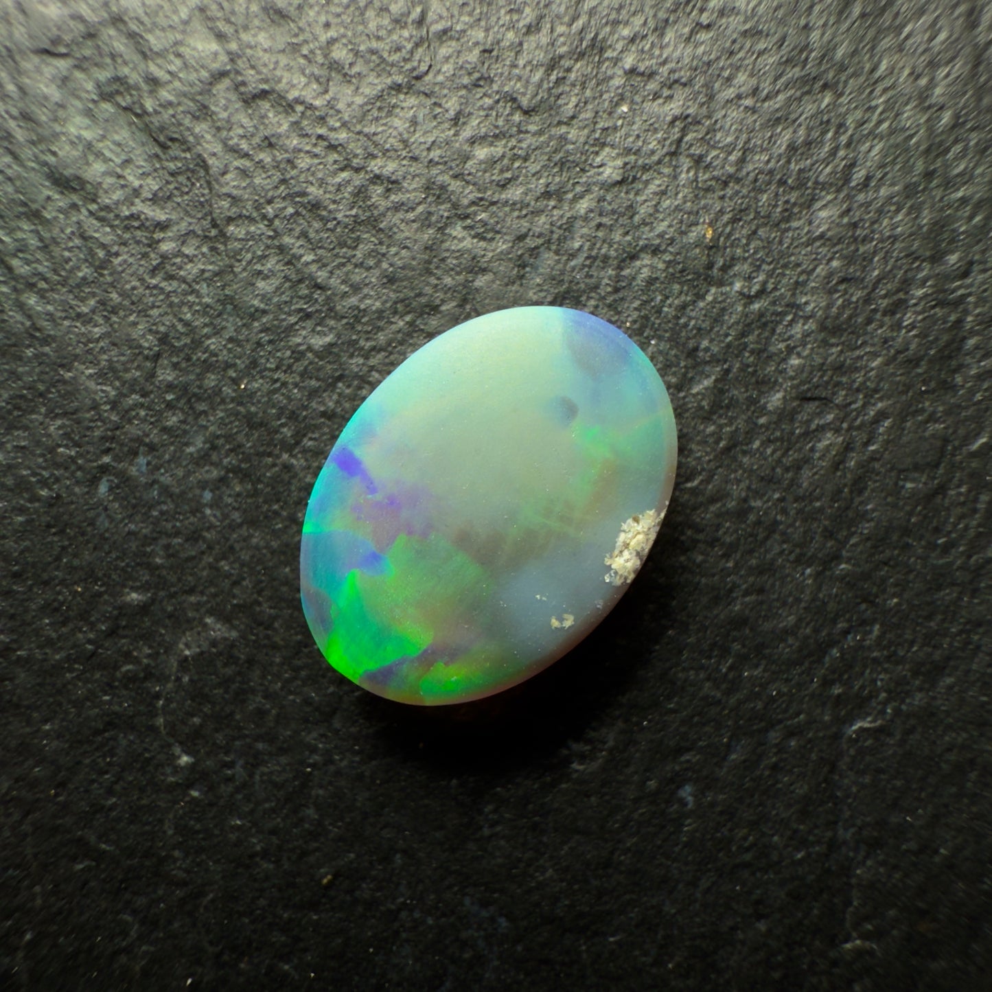 1.0ct Black Opal, This Gemm Has A Blindingly Bright Green Gold Color Palette And A Broadflash Pattern