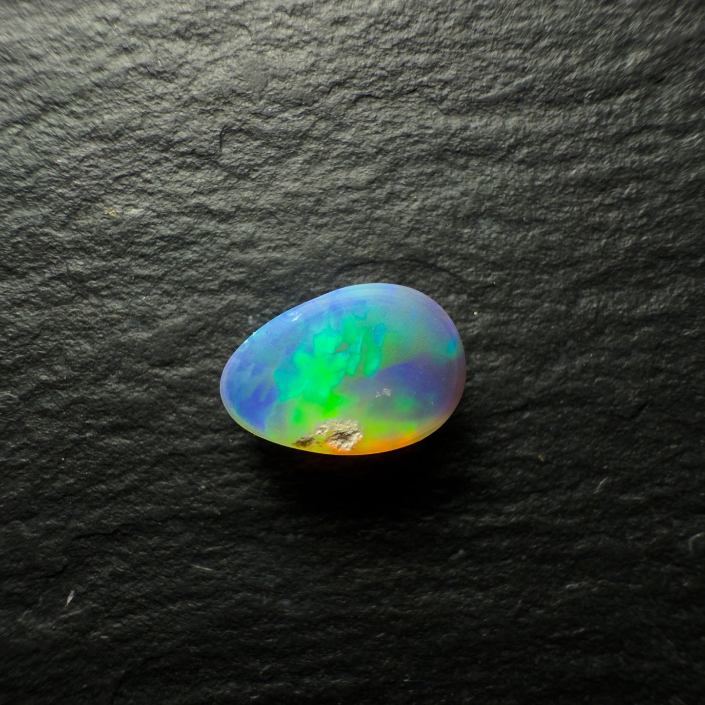 1.02ct Black Opal, This Gem Has A Vivid Green-Gold Rolling Broadflash Pattern