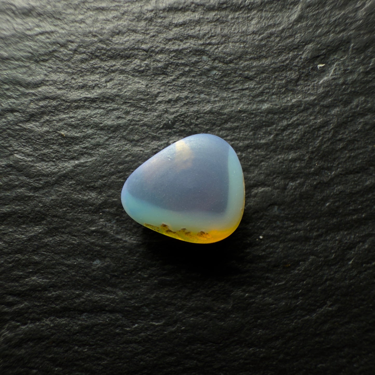 1.29ct black Opal, This Gem Has A Bright Green Blue Color Pallet With Rays Of Color Rolling Across The Stone