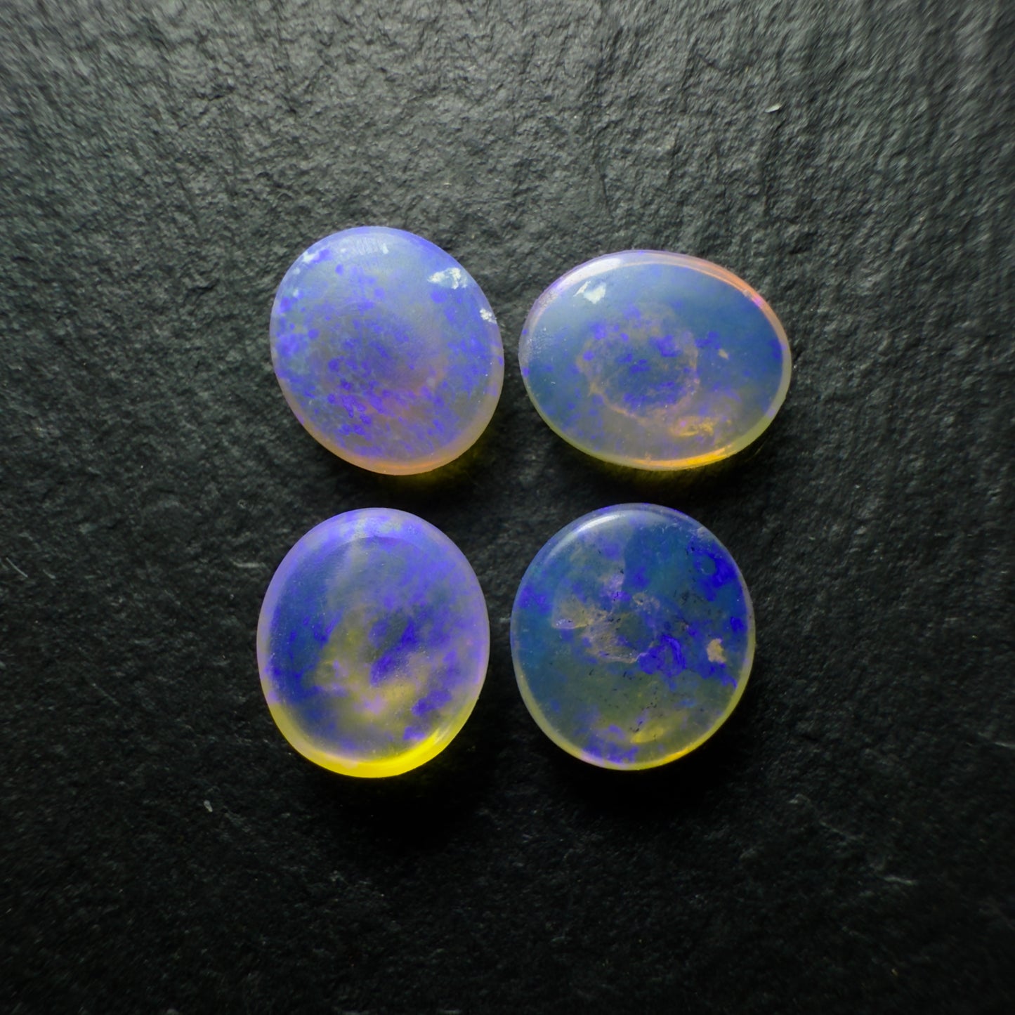 Pair (Price For Parcel) Crystal Opals With Deep Violet color play 2.5cts Total