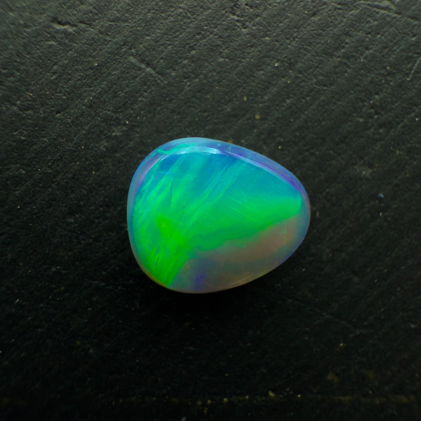 0.7ct Black Opal, This Stone Has An Vivid Green-Blue Rolling flash