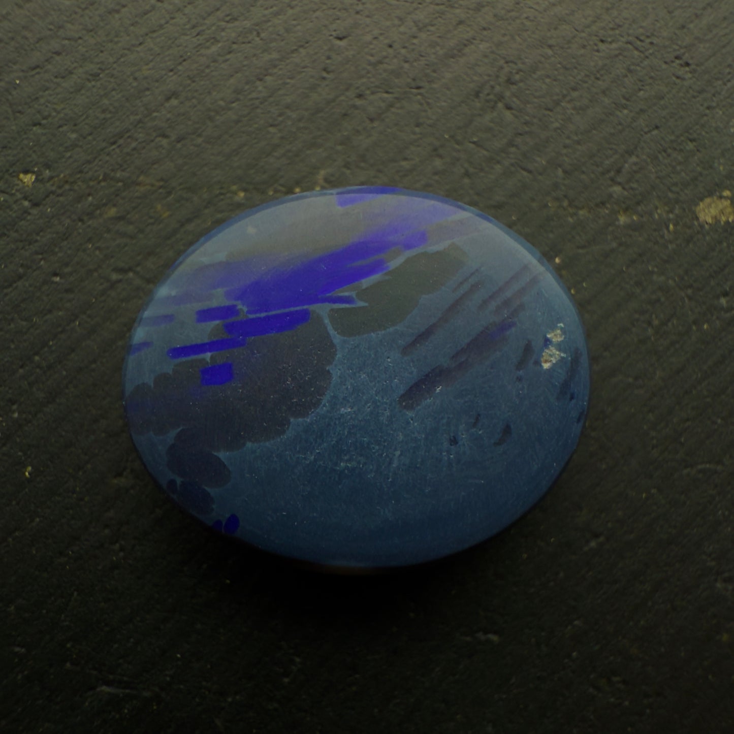 6.8ct Black Opal With A Flagstone Pattern And Color Fading From Aqua To Royal Blue