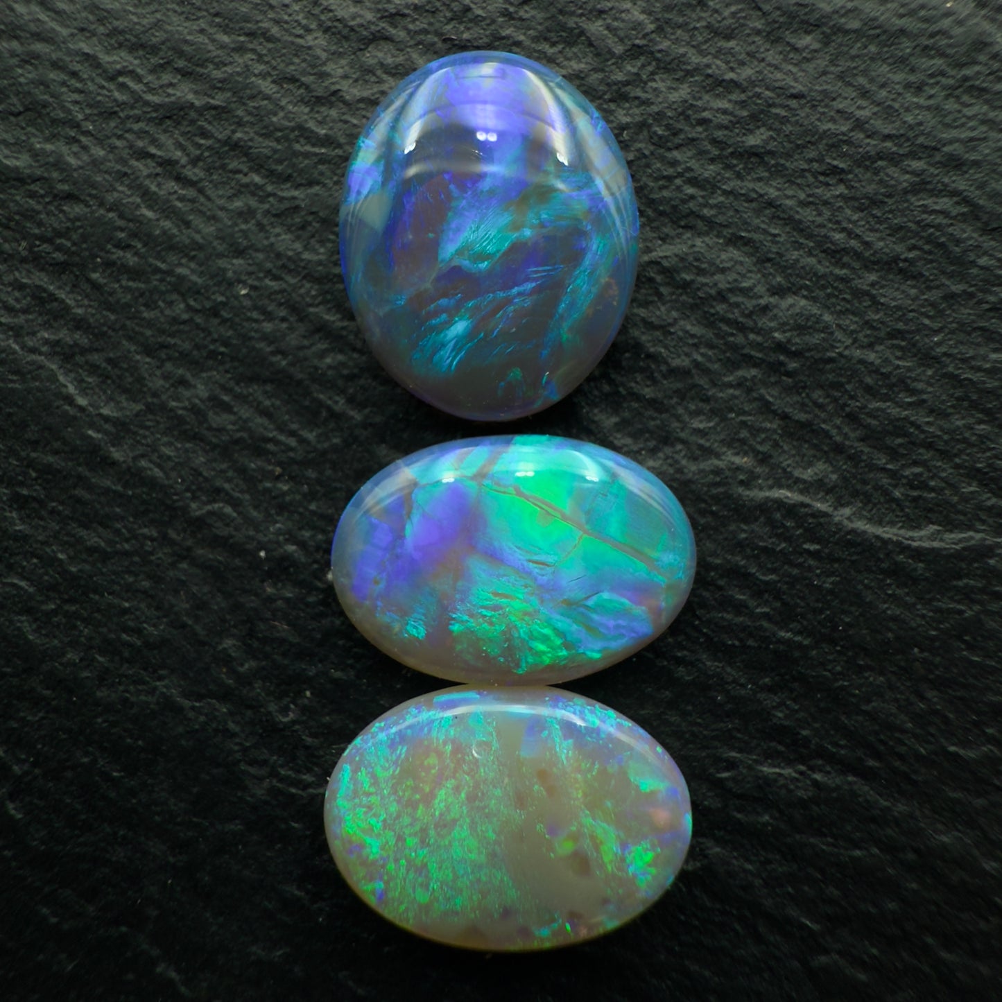 4.5ct Bundle (Price For Parcel) Larger Dark Opals With Minty Greens And Blues
