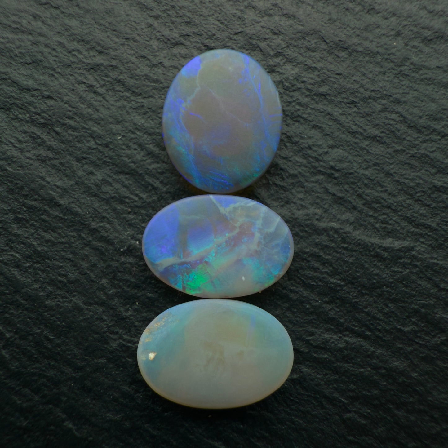 4.5ct Bundle (Price For Parcel) Larger Dark Opals With Minty Greens And Blues