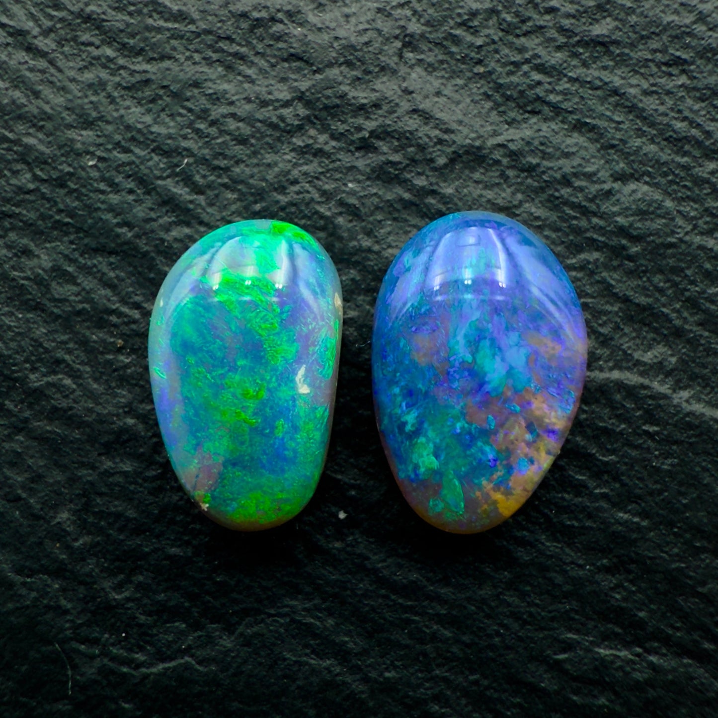 2.33ct Mismatched Pair (Price For Parcel) Black Opals With Blues And Greens And A Freeform Shape