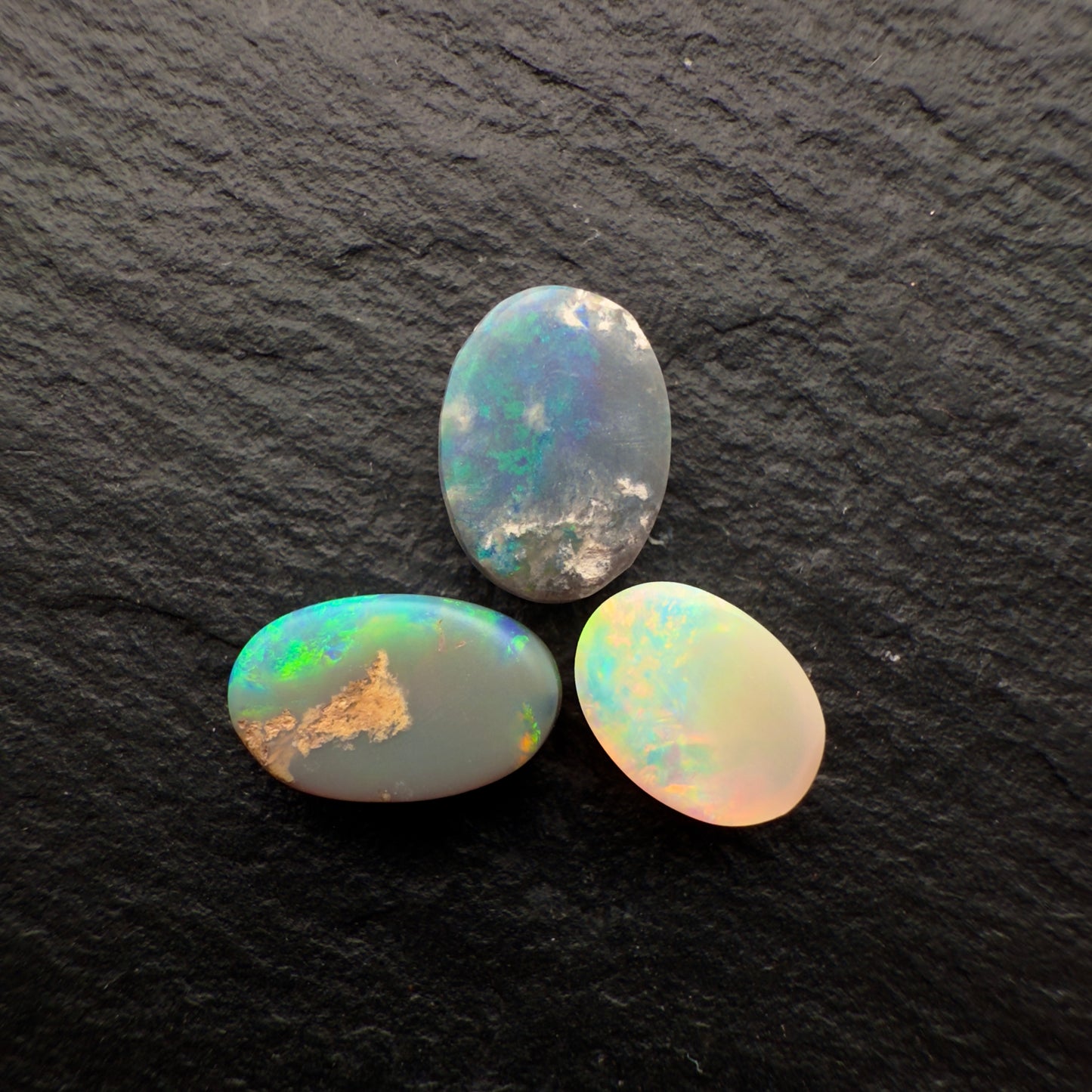2.84ct BUNDLE (Price For Parcel) Assorted Crystal And Dark Opals With Bright Colors