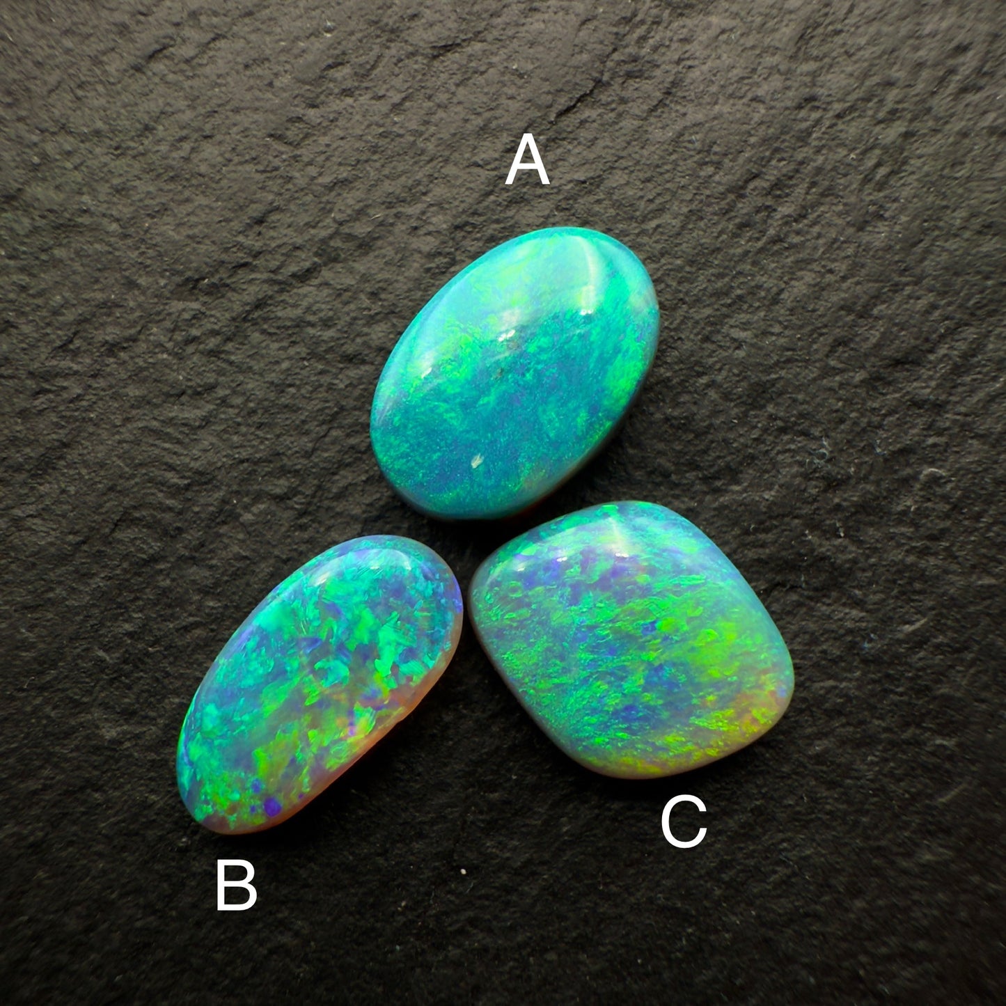 (Price Per Stone) Dark Opals With Vivid Aqua Colors And Moss Patterns