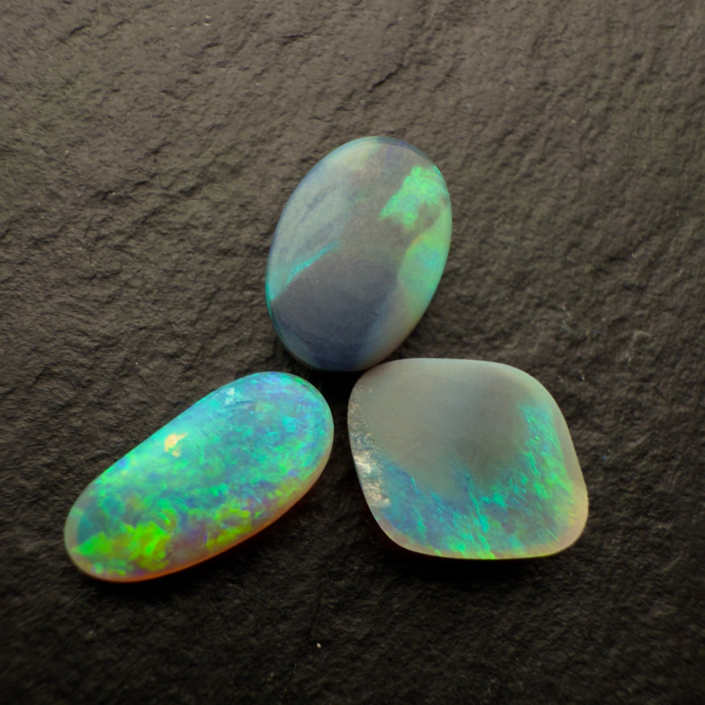 (Price Per Stone) Dark Opals With Vivid Aqua Colors And Moss Patterns