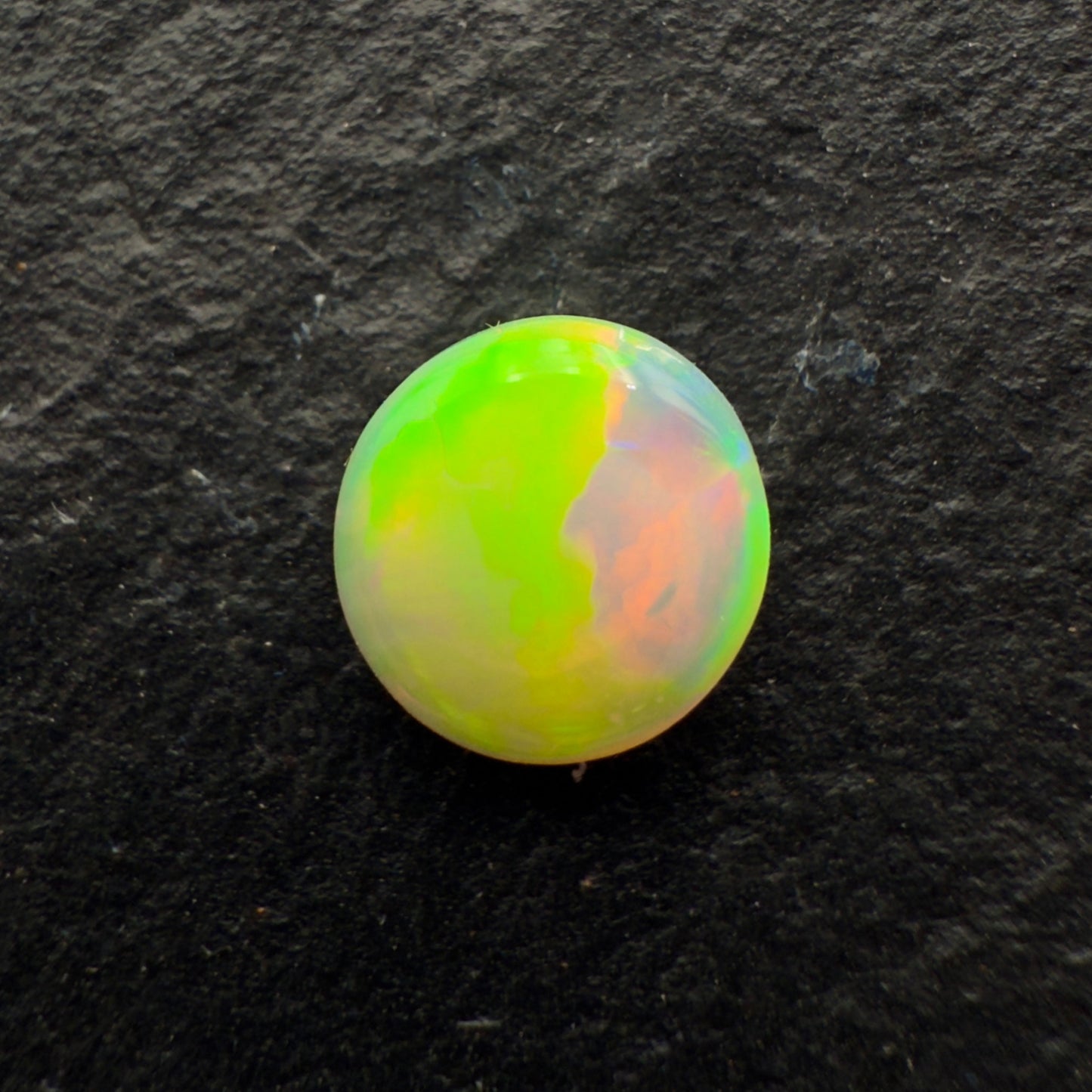 0.8ct Crystal Opal With A Beautiful Mango Color Palette And Lots Of Depth