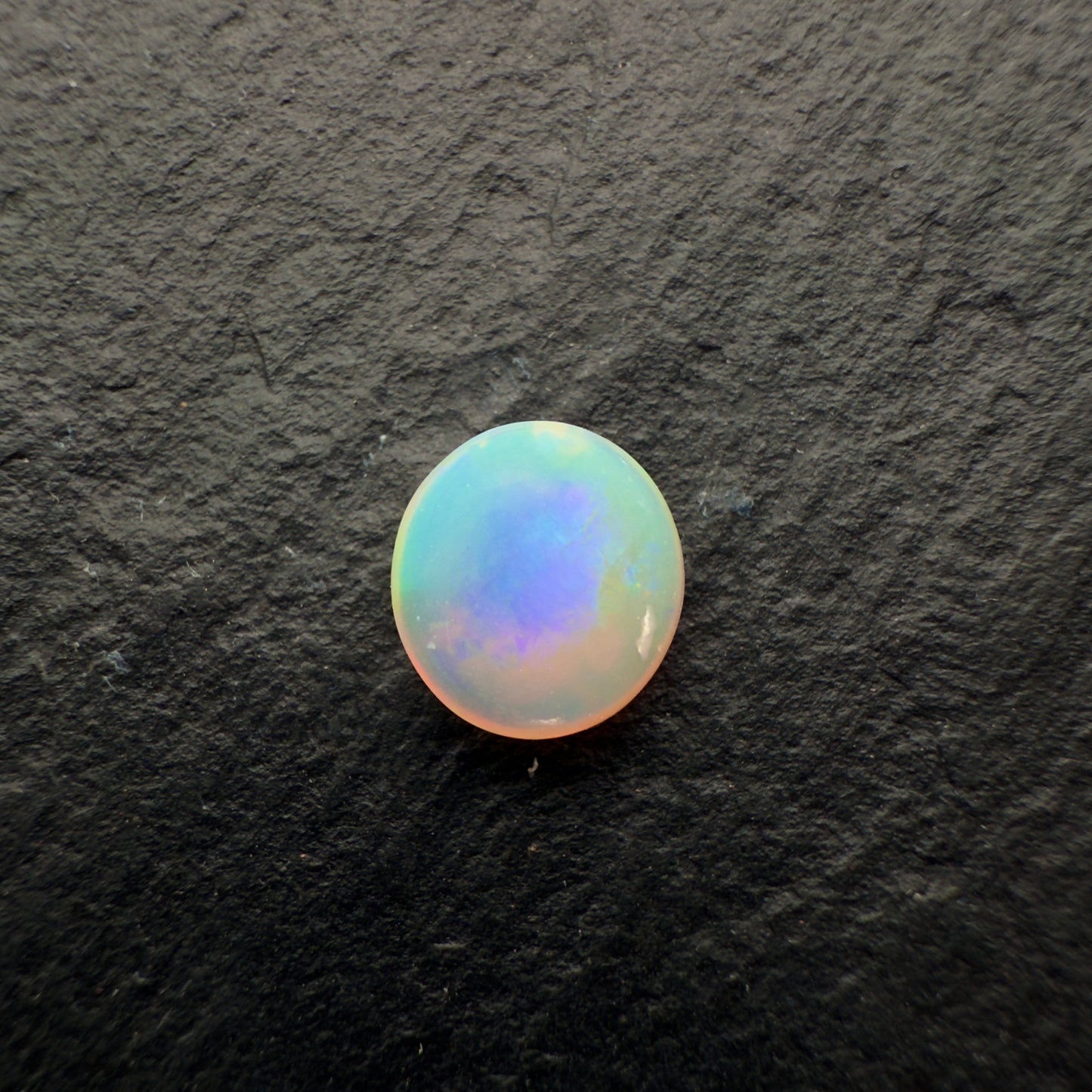 0.8ct Crystal Opal With A Beautiful Mango Color Palette And Lots Of Depth