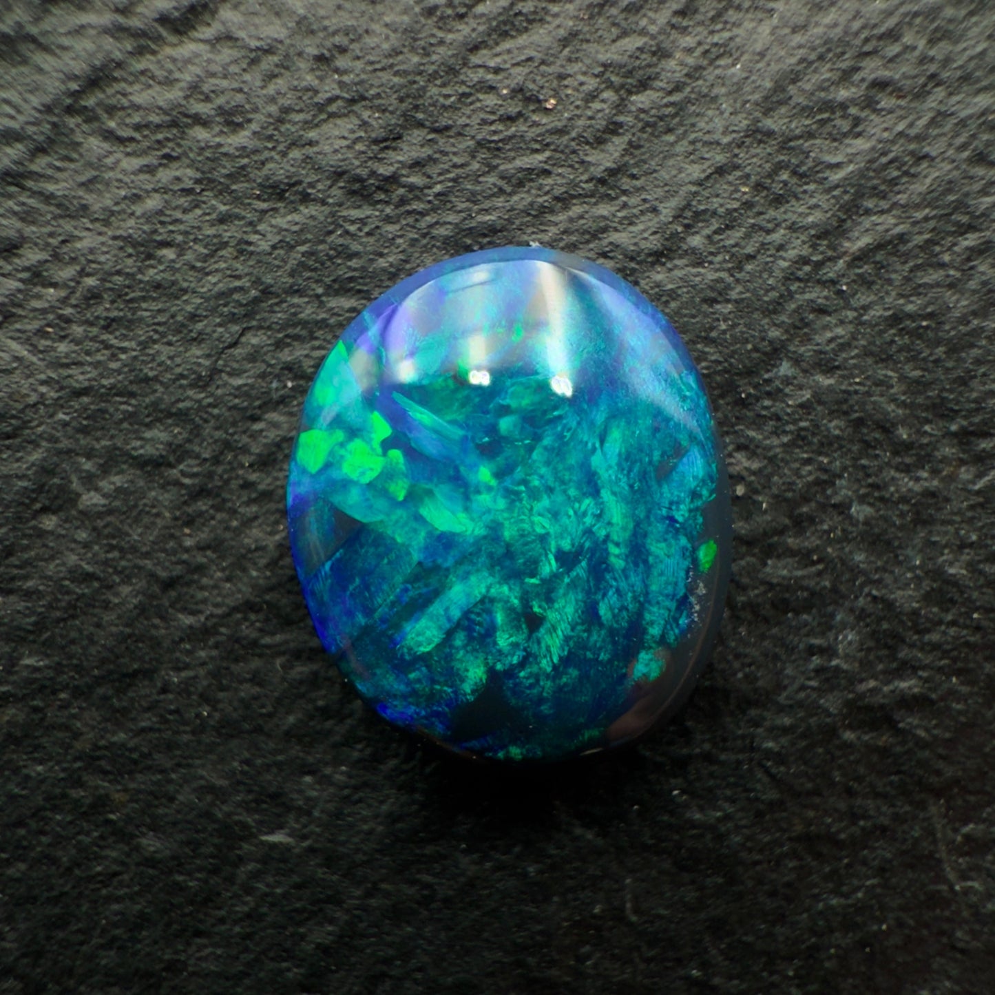 0.73cts Black Opals With Vivid Blue-Green Color Play And A Moss Pattern