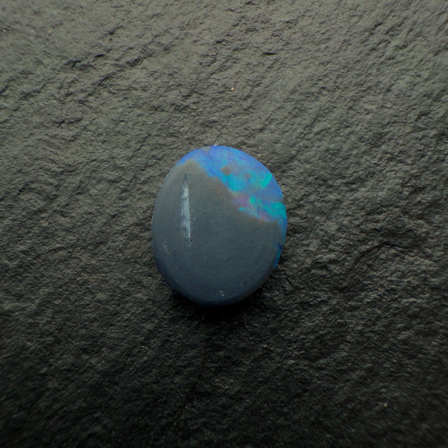 0.73cts Black Opals With Vivid Blue-Green Color Play And A Moss Pattern