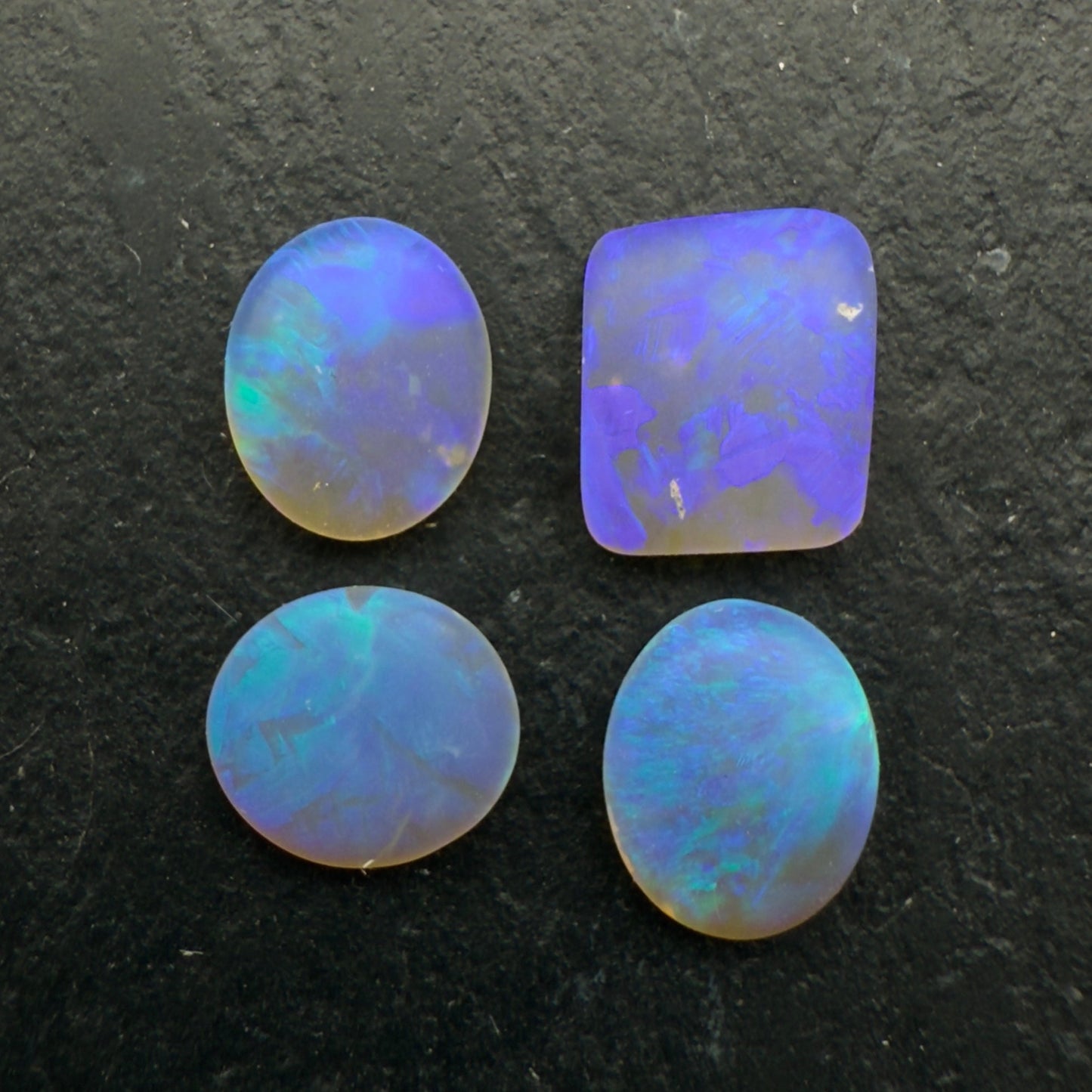 2.34ct Bundle (Price For Parcel) Matte finished opals with a soft purple-green glow