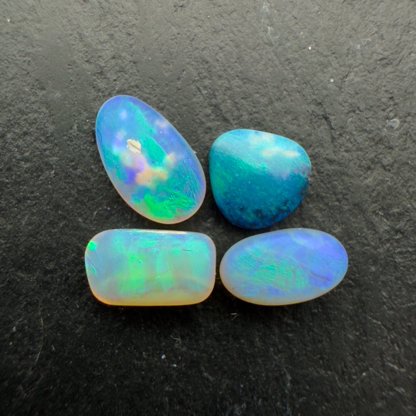1.8ct Bundle (Price For Parcel) Matte finished opals with a soft green-blue glow