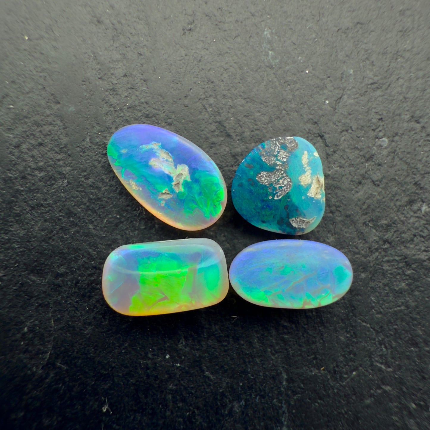 1.8ct Bundle (Price For Parcel) Matte finished opals with a soft green-blue glow