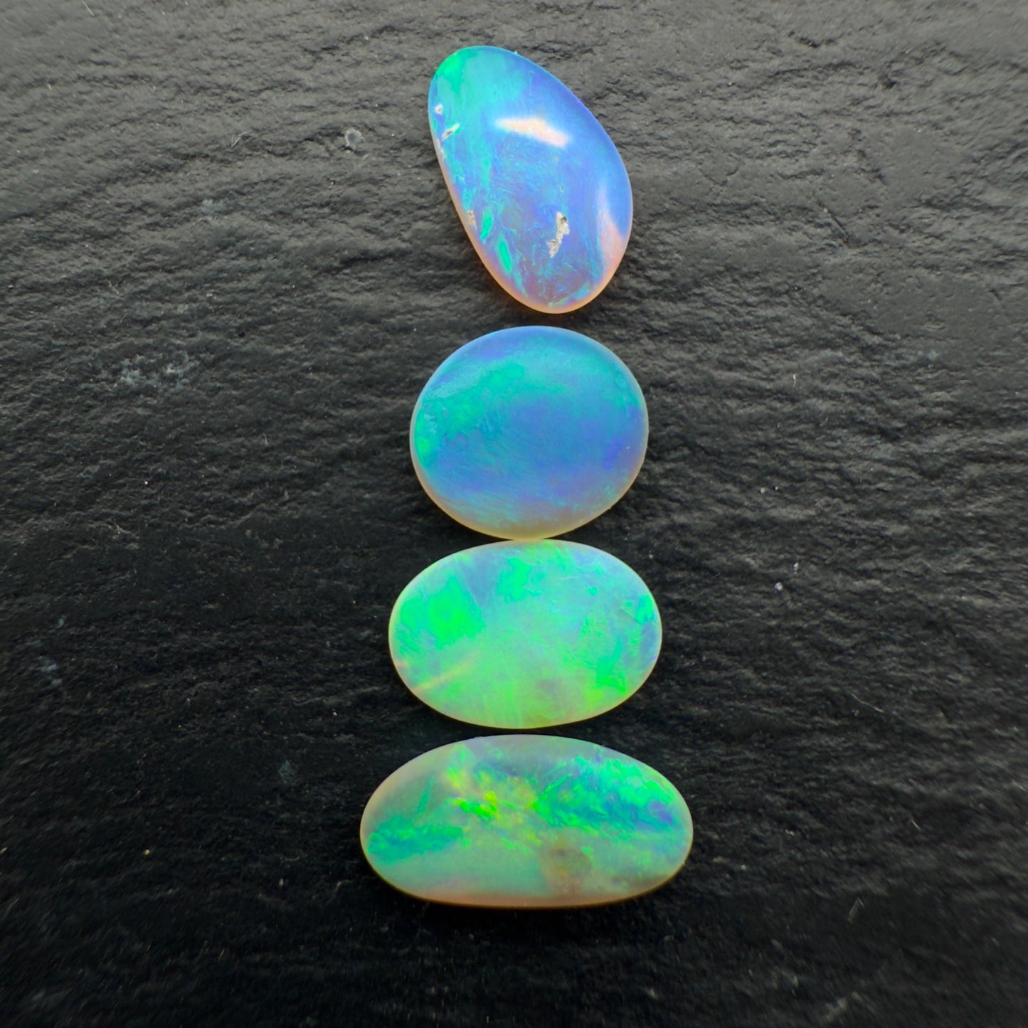 2.3ct Bundle (Price For Parcel) Matte finished opals with a soft green-blue glow