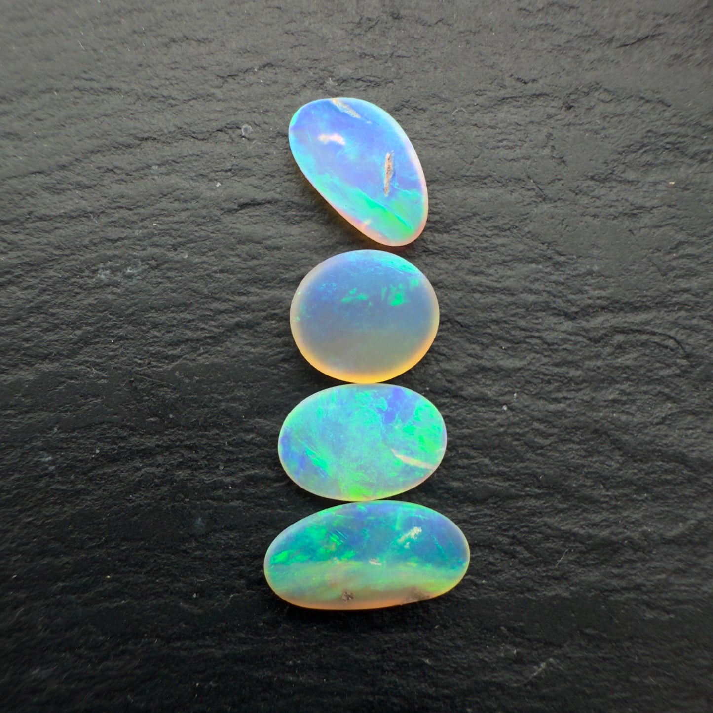 2.3ct Bundle (Price For Parcel) Matte finished opals with a soft green-blue glow