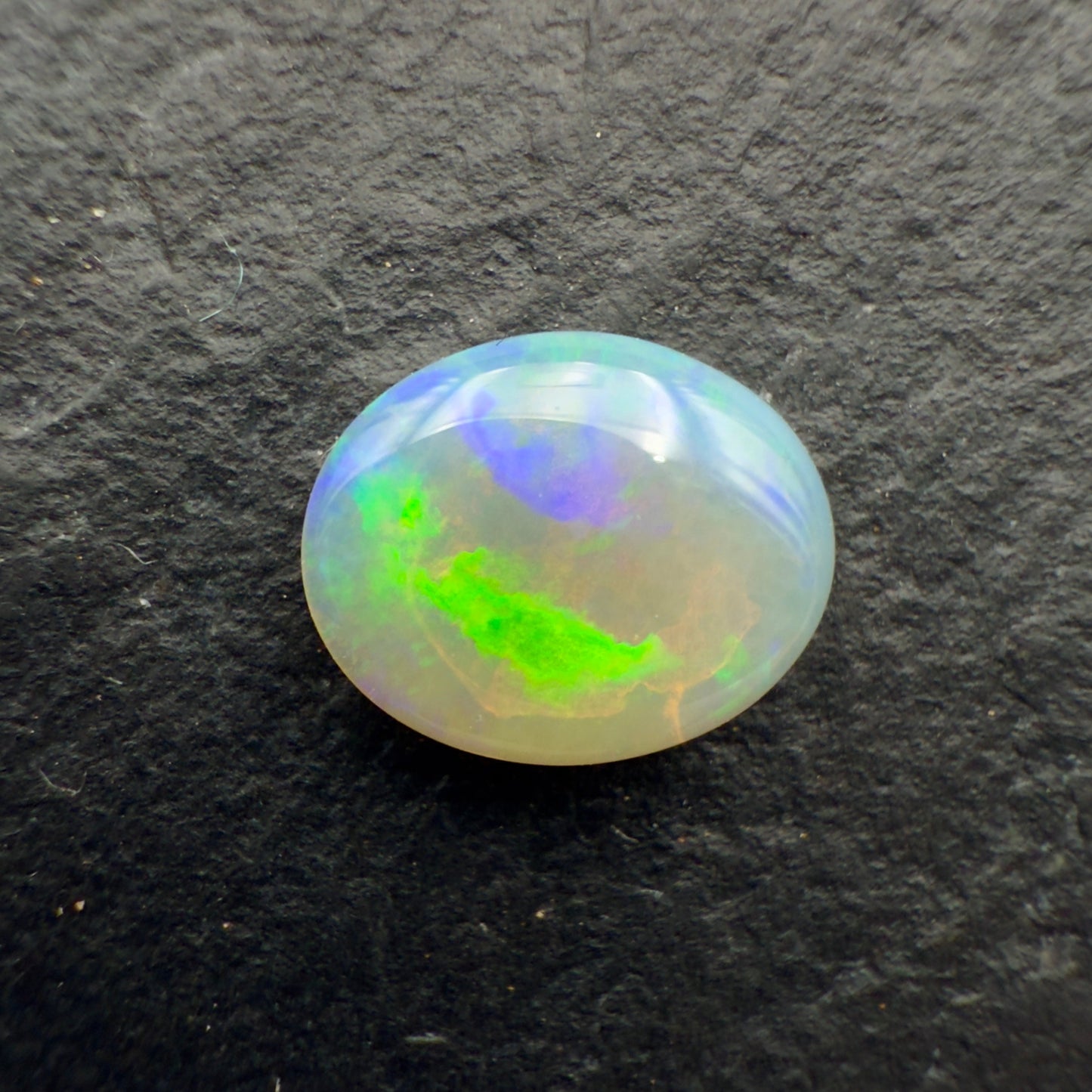 1.1ct Affordable Dark Crystal Opal With A Vivid Yellow Catseye