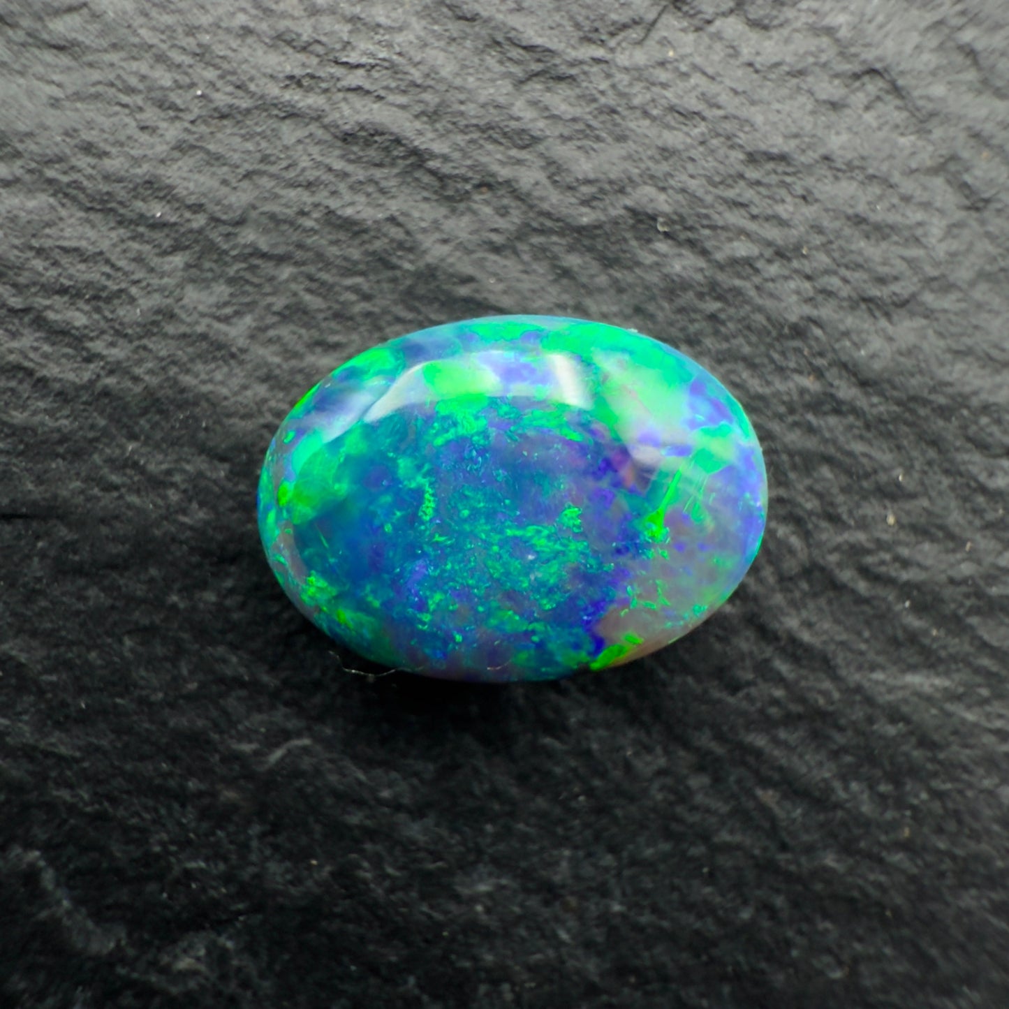 0.91ct Gem Black opal With AVivid Moss Pattern
