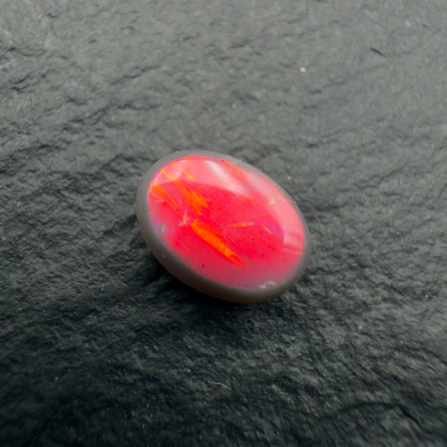 0.55ct Top Gem Black Opal With Ultra Rare Pigeons Blood Red color