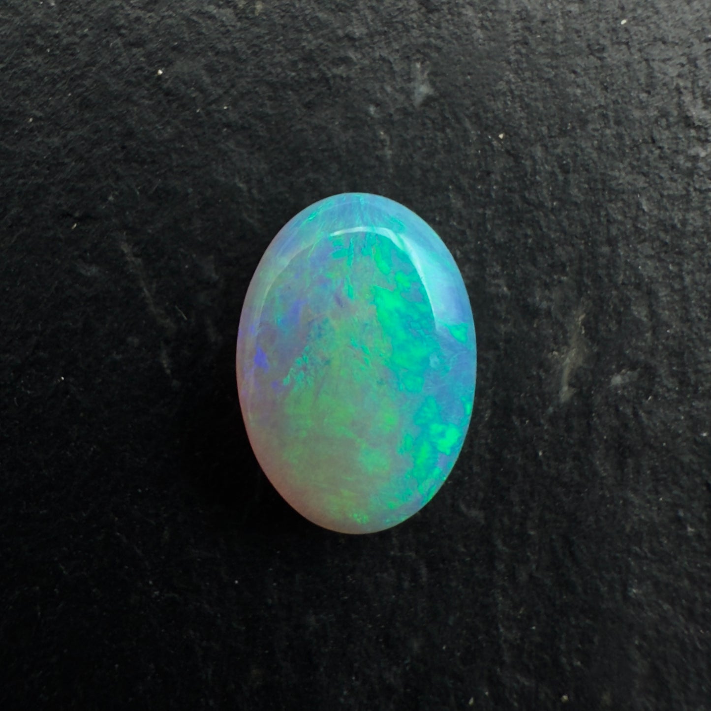 1.05Ct Affordable Crystal Opal With Light greens And Depth Of Color