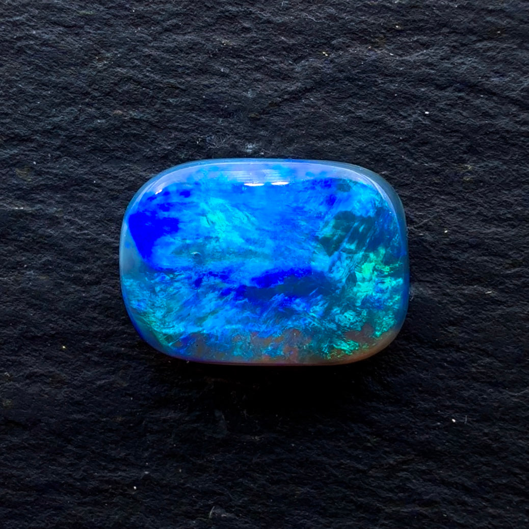 1.85 Gem Black Opal With Rich Blues-Greens And A Moss Pattern