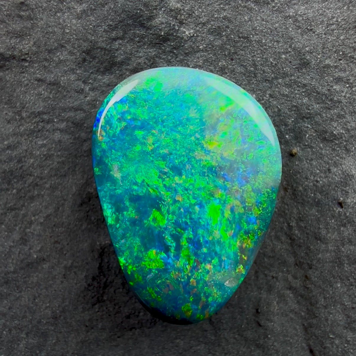 1.8cts Affordable Gem Black Opal With A Pinfire pattern And Deep Green, Blue and Gold Colorplay