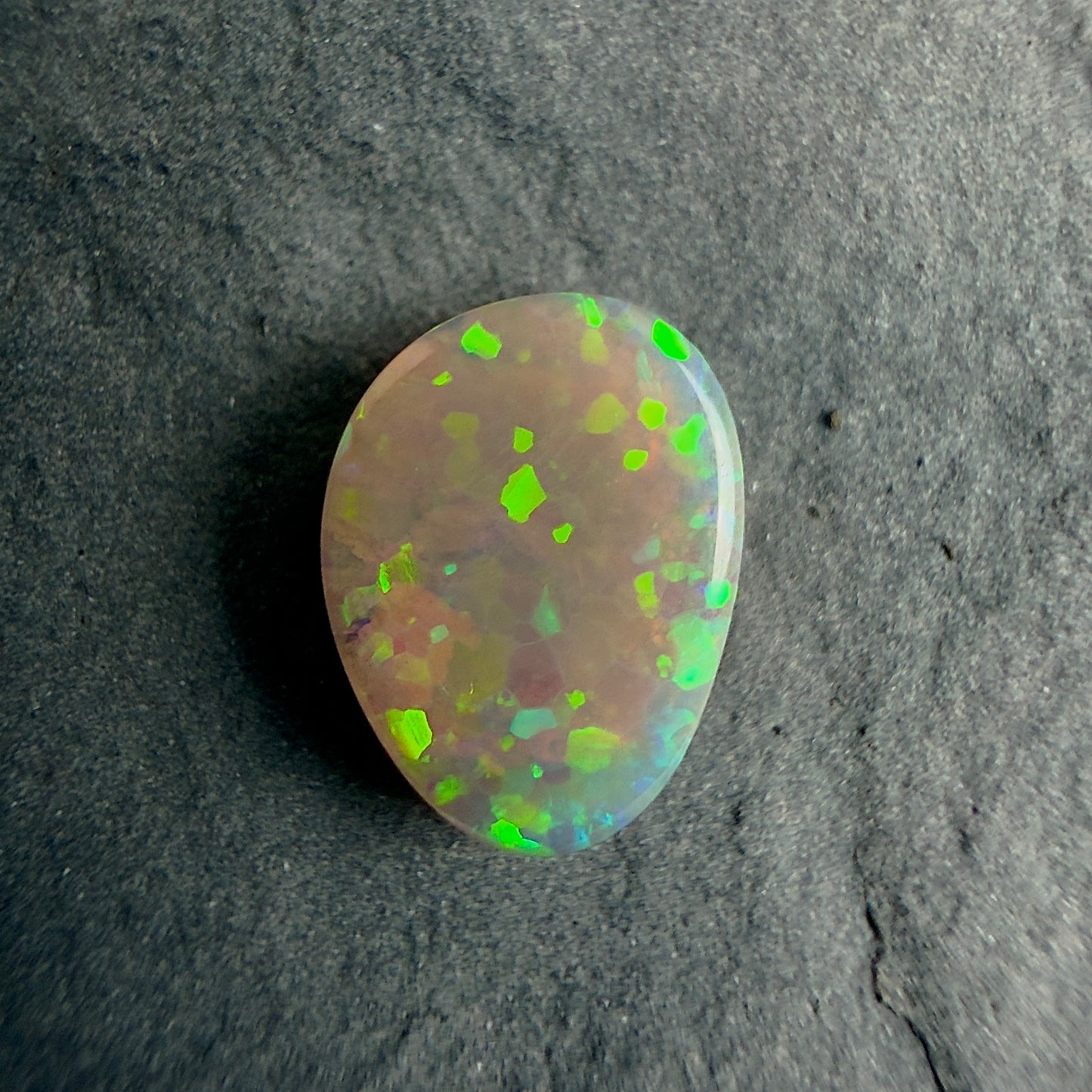 1.07cts Afordable Gem Dark Opal With Green Blocky Pattern