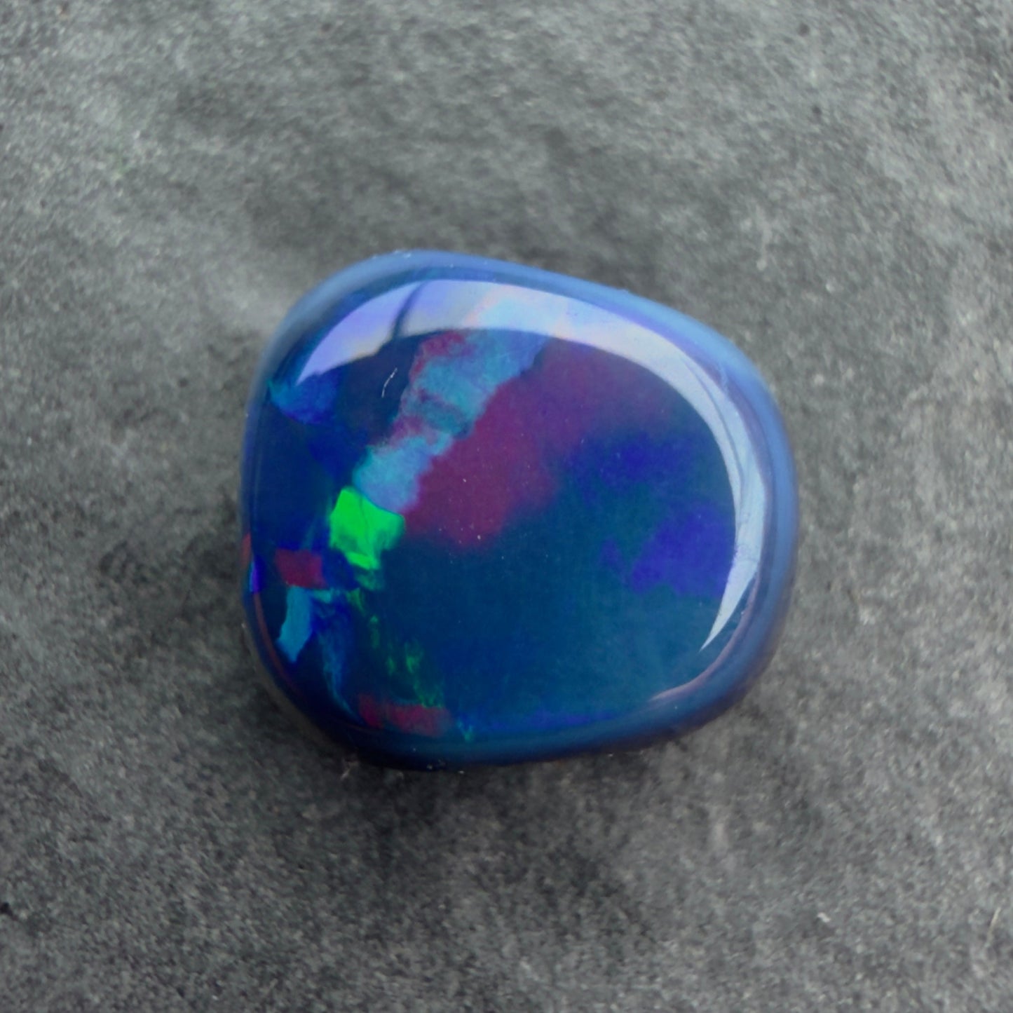 1.63cts Affordable Black Opal With A Deep Blue Green Play of color