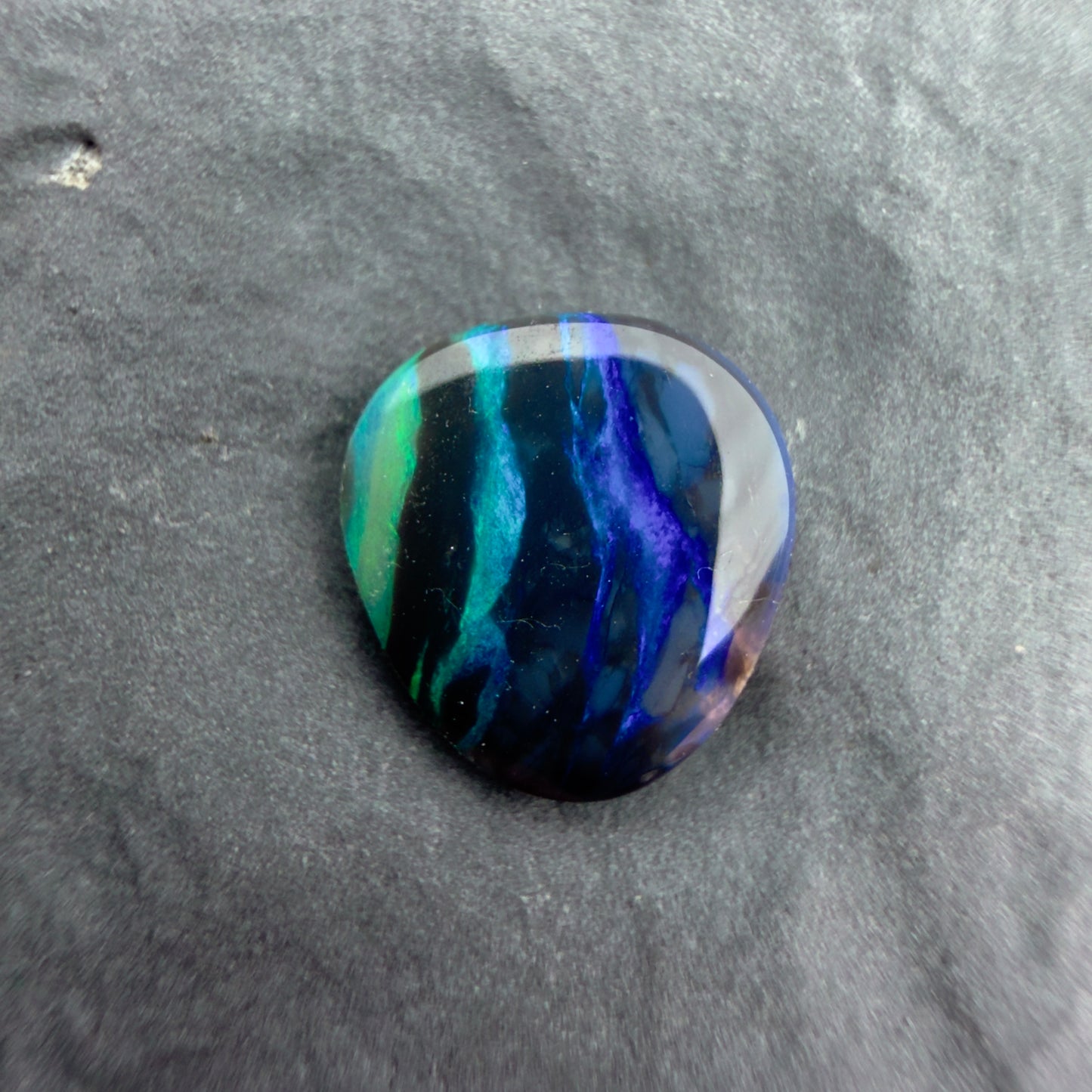 0.7cts Affordable Dark Opal With A Green Blue Palette
