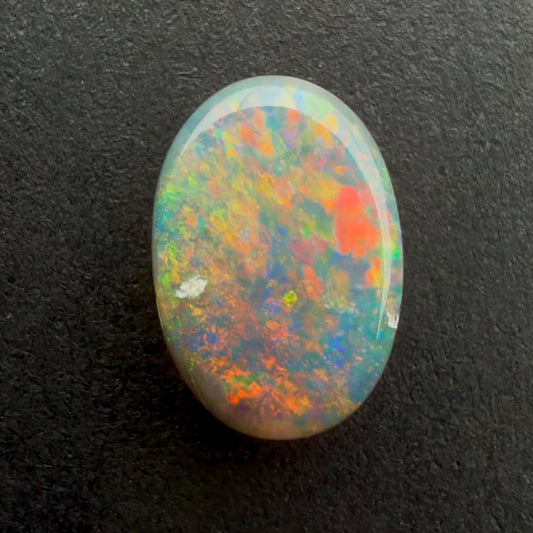 0.48cts Dark Opal With A Red Pink Multicolor Play Of Color, From Lightning Ridge Australia