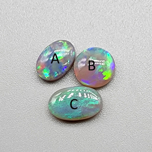 Assorted Dark opals with mixed patterns and green-blue-yellow color play