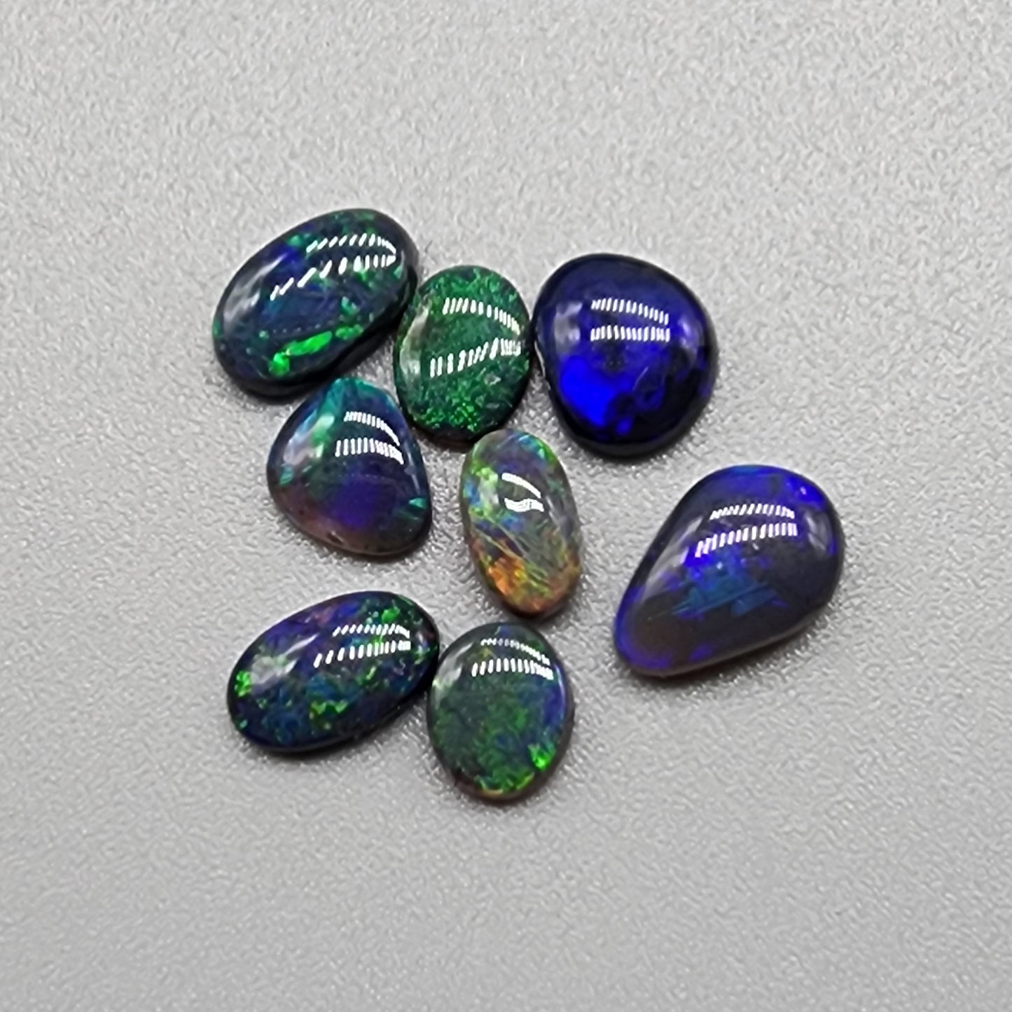 Assorted Black Opals: mixed colors and patterns for an incredibly obtainable price when it comes to black opal